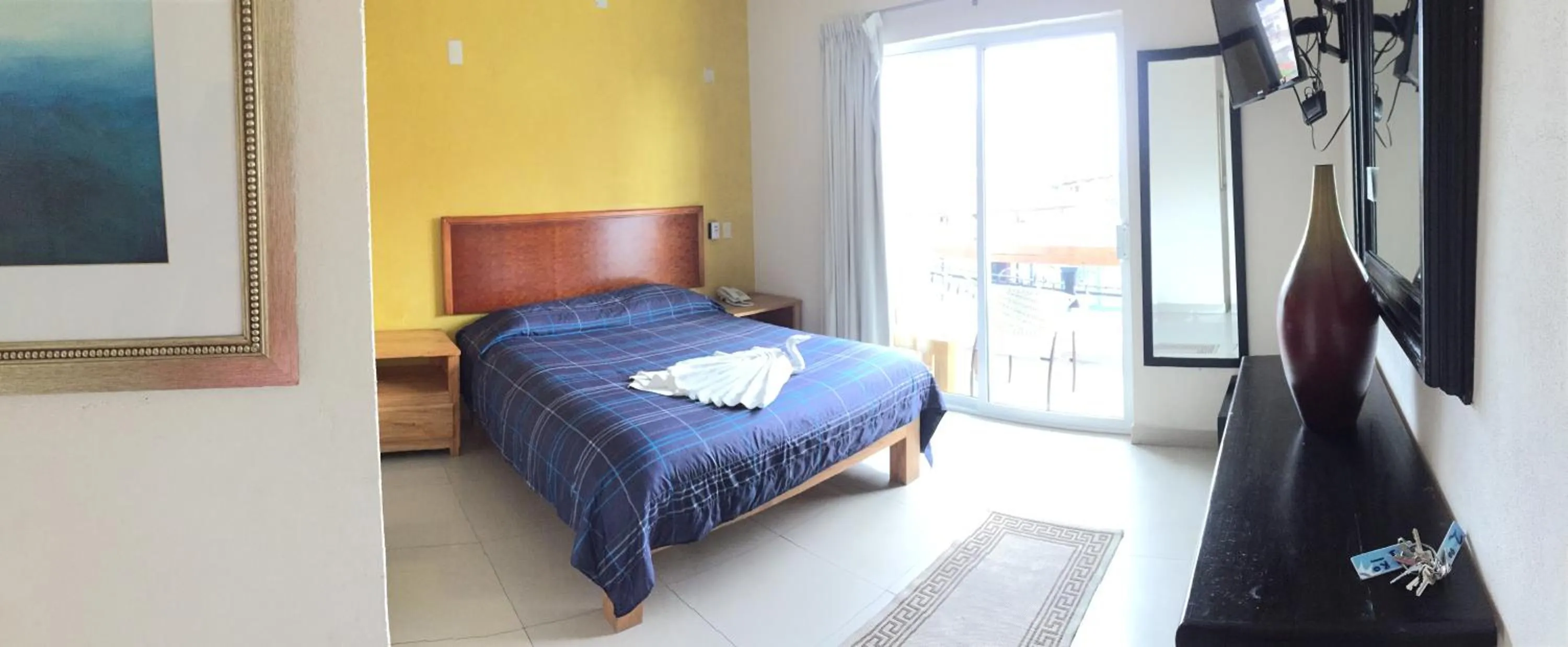 Bed in Casa del Parque Vallarta