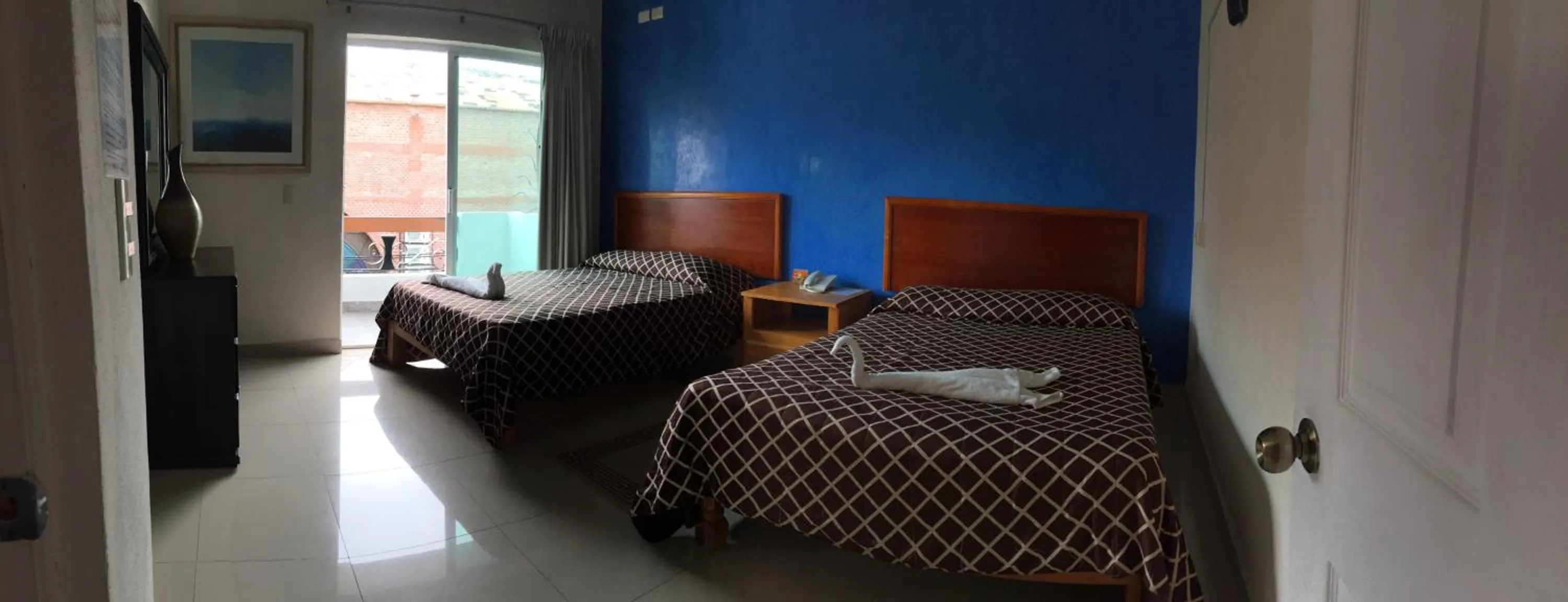 Bed in Casa del Parque Vallarta