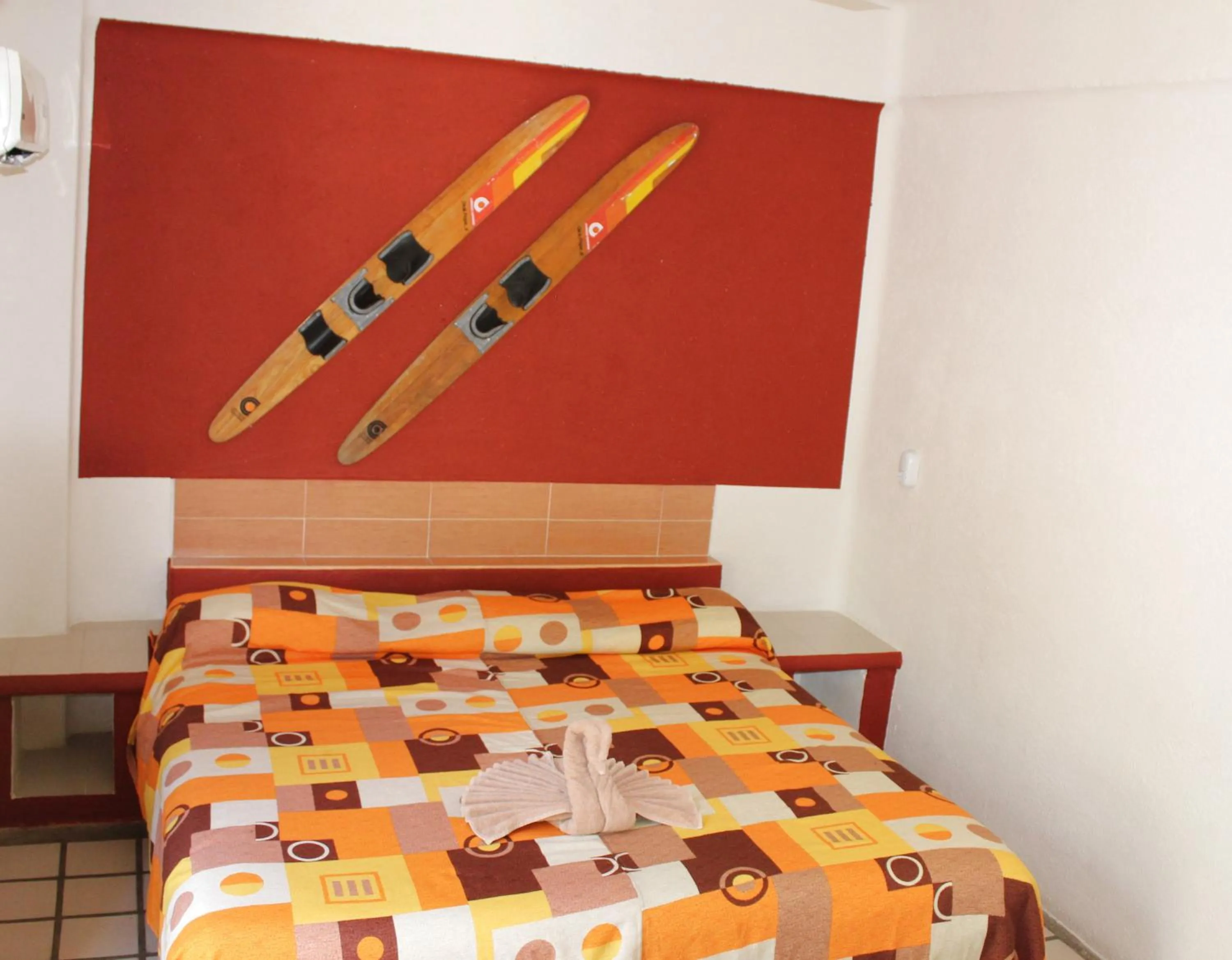 Bed in Hotel Arrecife Huatulco Plus