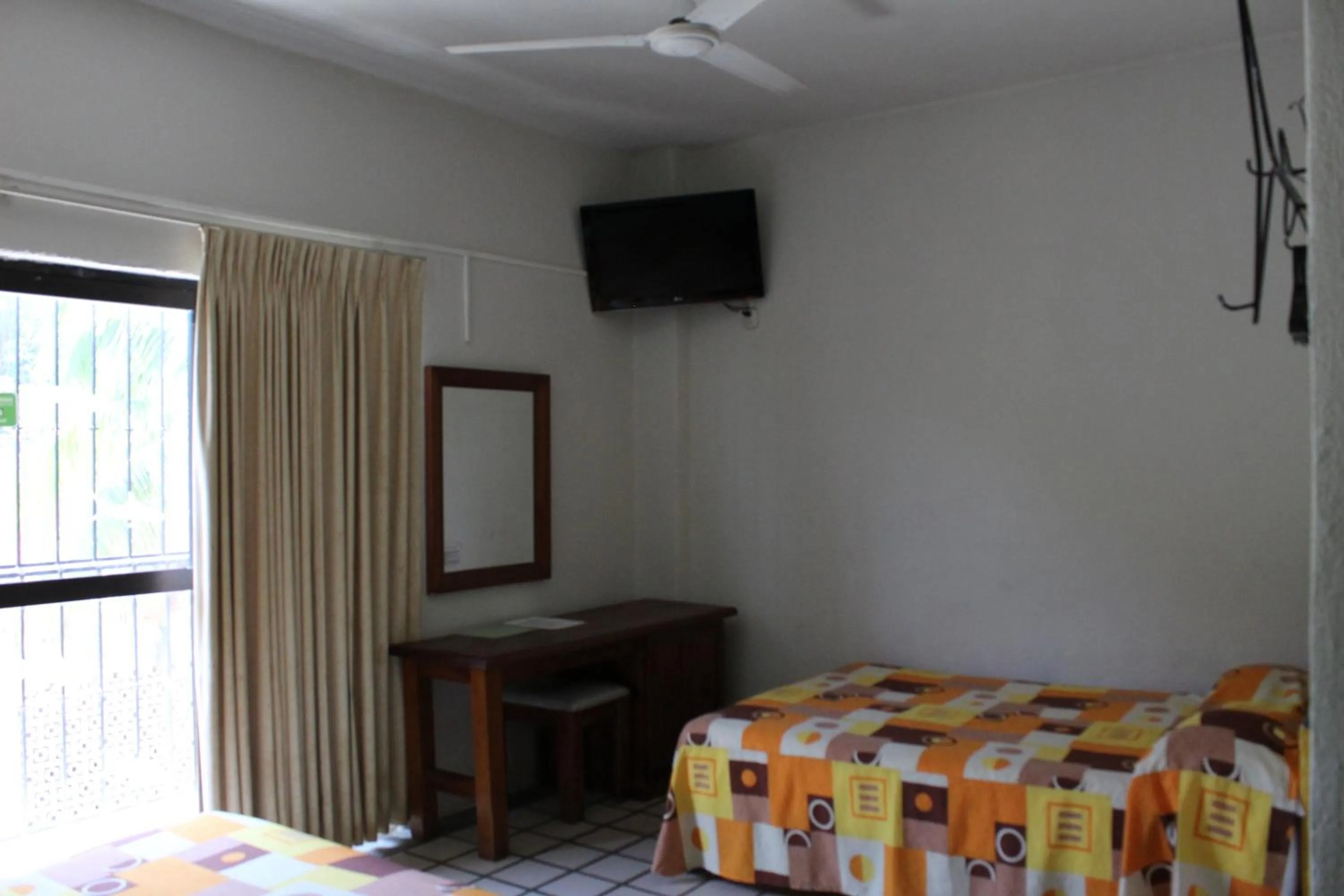 Bed in Hotel Arrecife Huatulco Plus