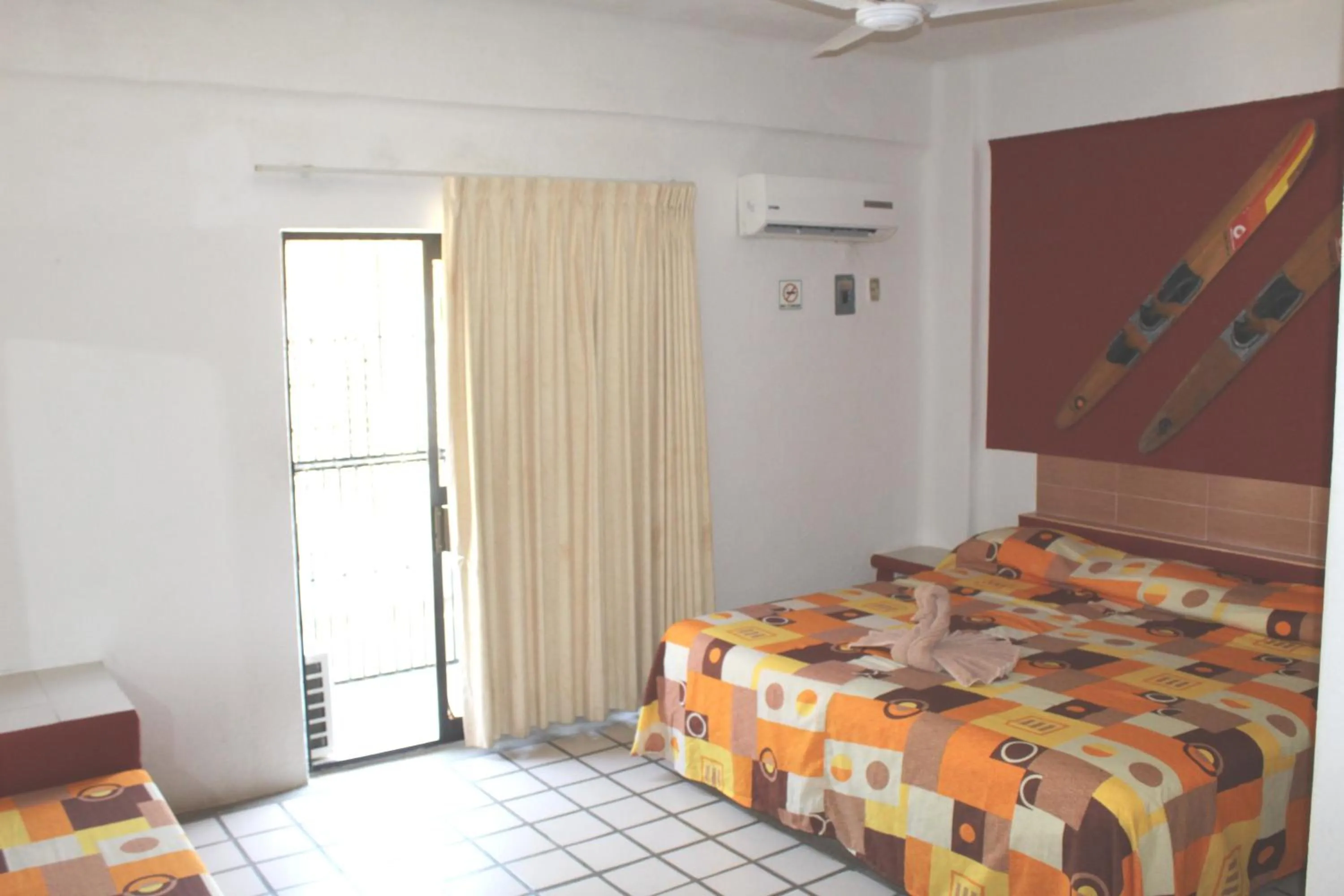 Bed in Hotel Arrecife Huatulco Plus