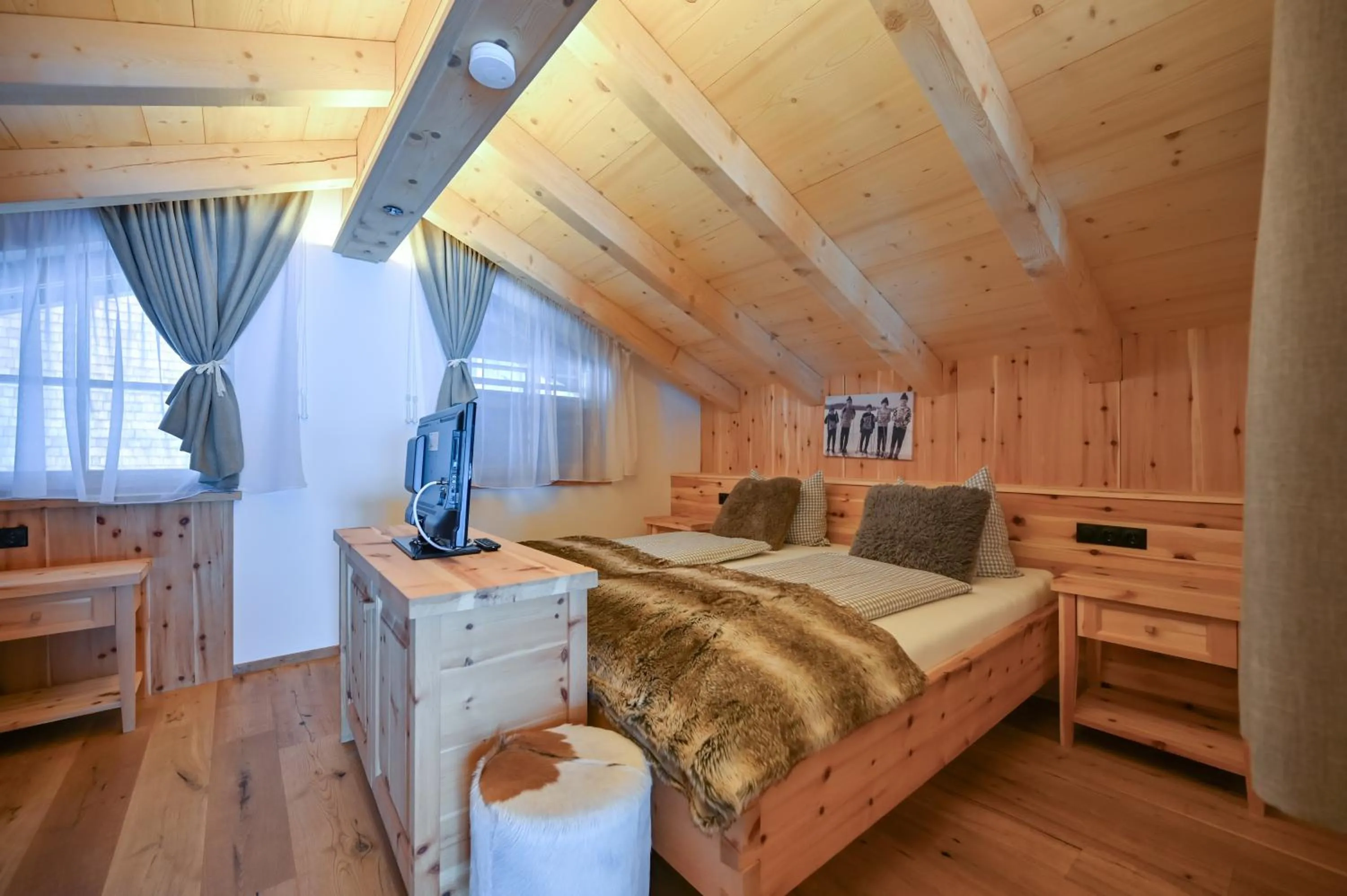 Bedroom, Bed in Braito's Seaside Lodges und Suites, Ferienhäuser und Ferienwohnungen