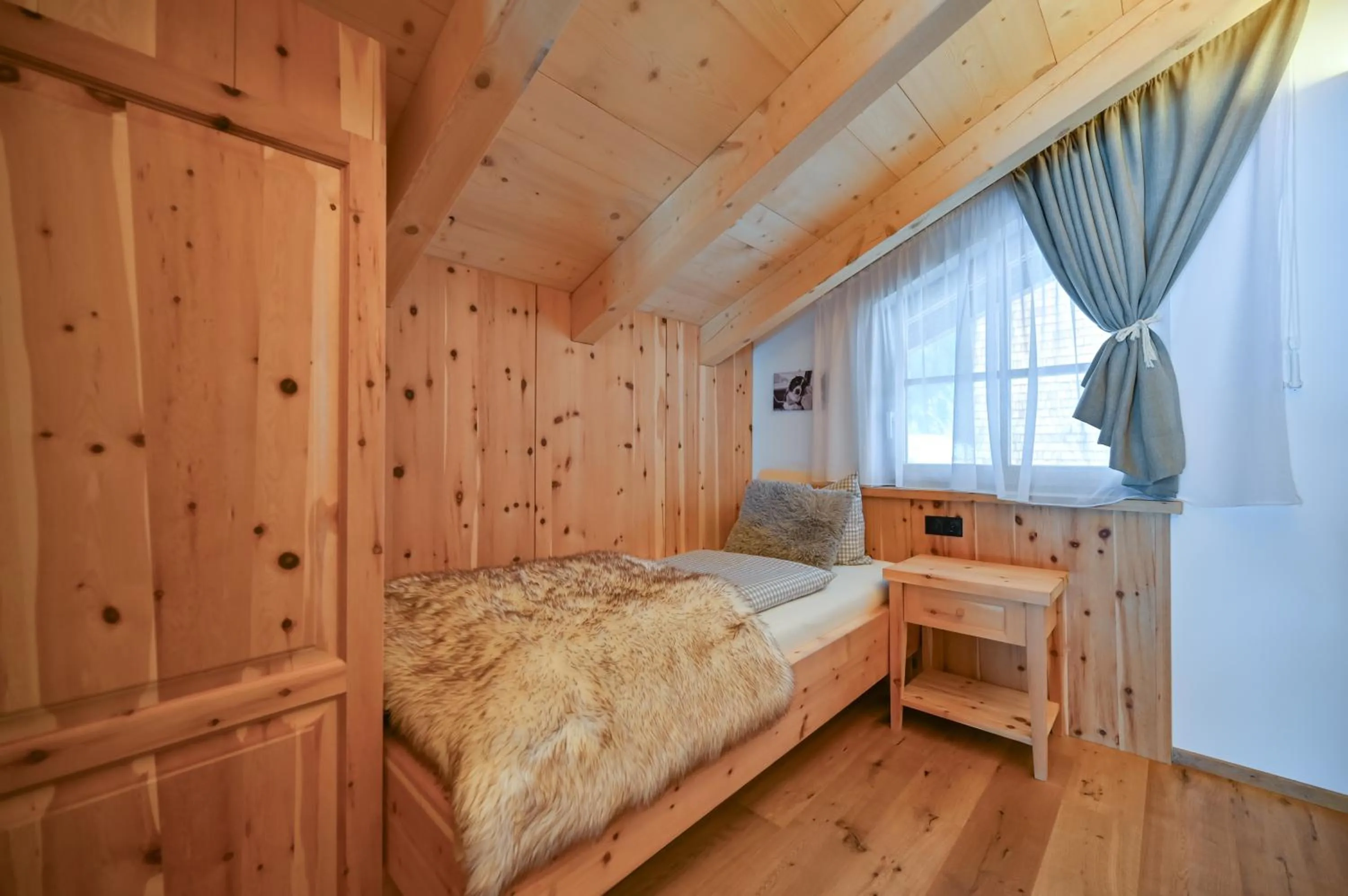 Bedroom, Bed in Braito's Seaside Lodges und Suites, Ferienhäuser und Ferienwohnungen