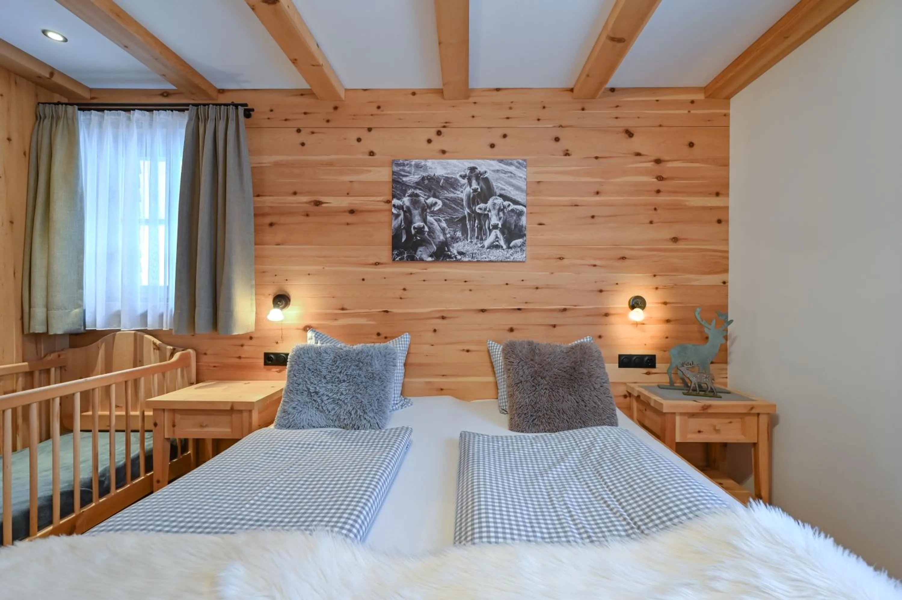 Bedroom, Bed in Braito's Seaside Lodges und Suites, Ferienhäuser und Ferienwohnungen
