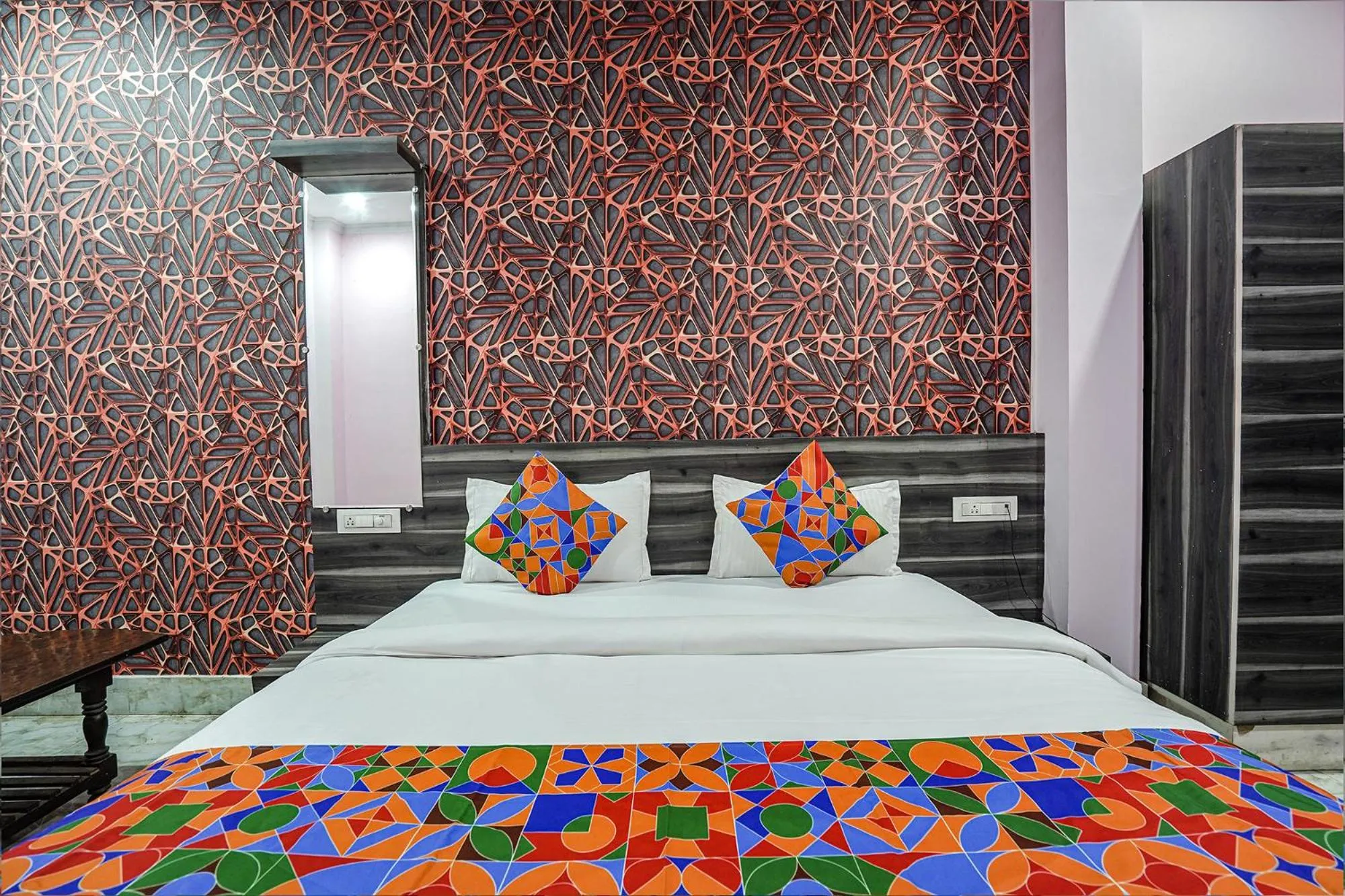 Bed in FabHotel Deepak Palace