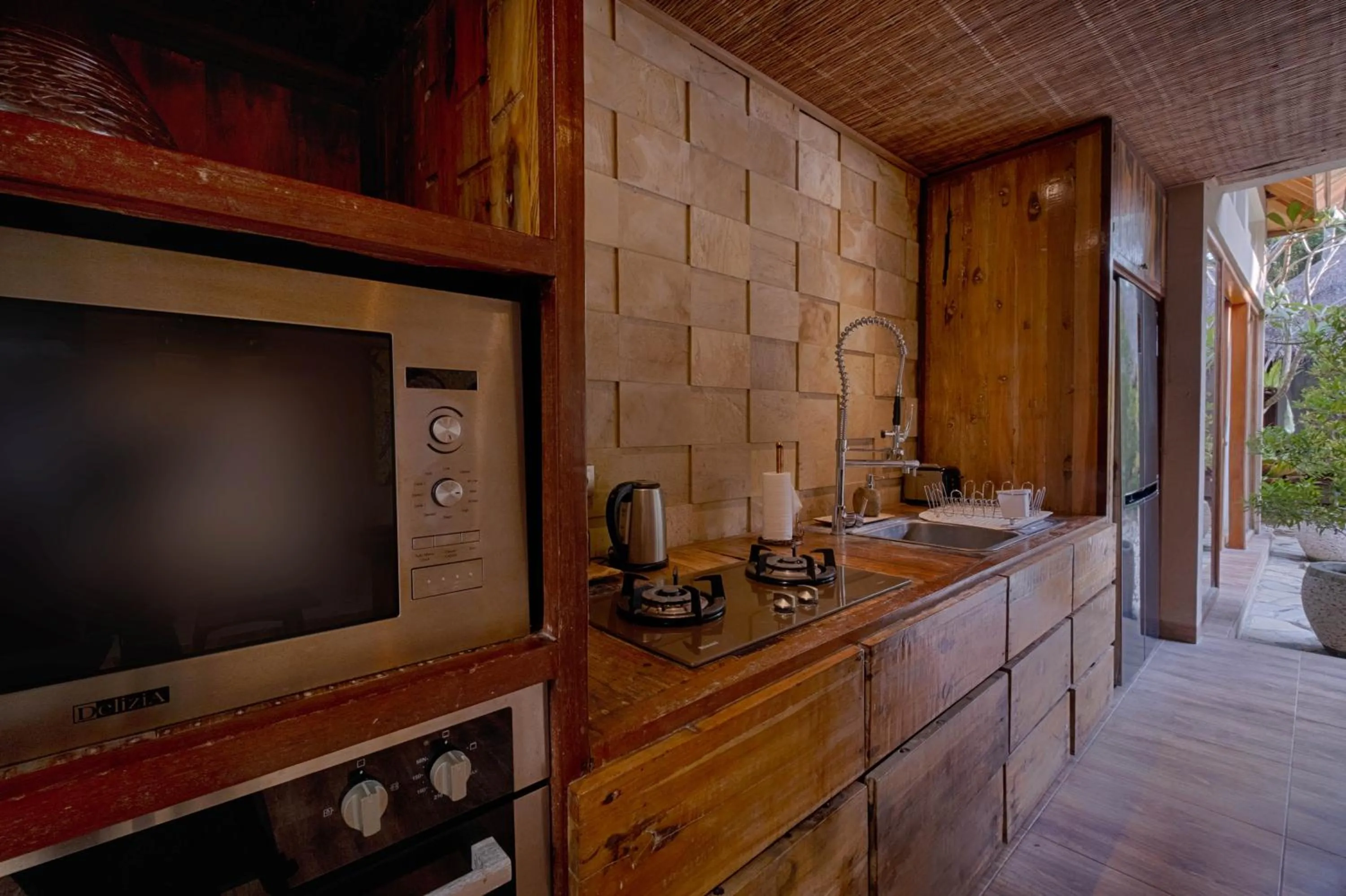 Kitchen or kitchenette in Mas Ubud Villa by Sanga Sanga Hospitality