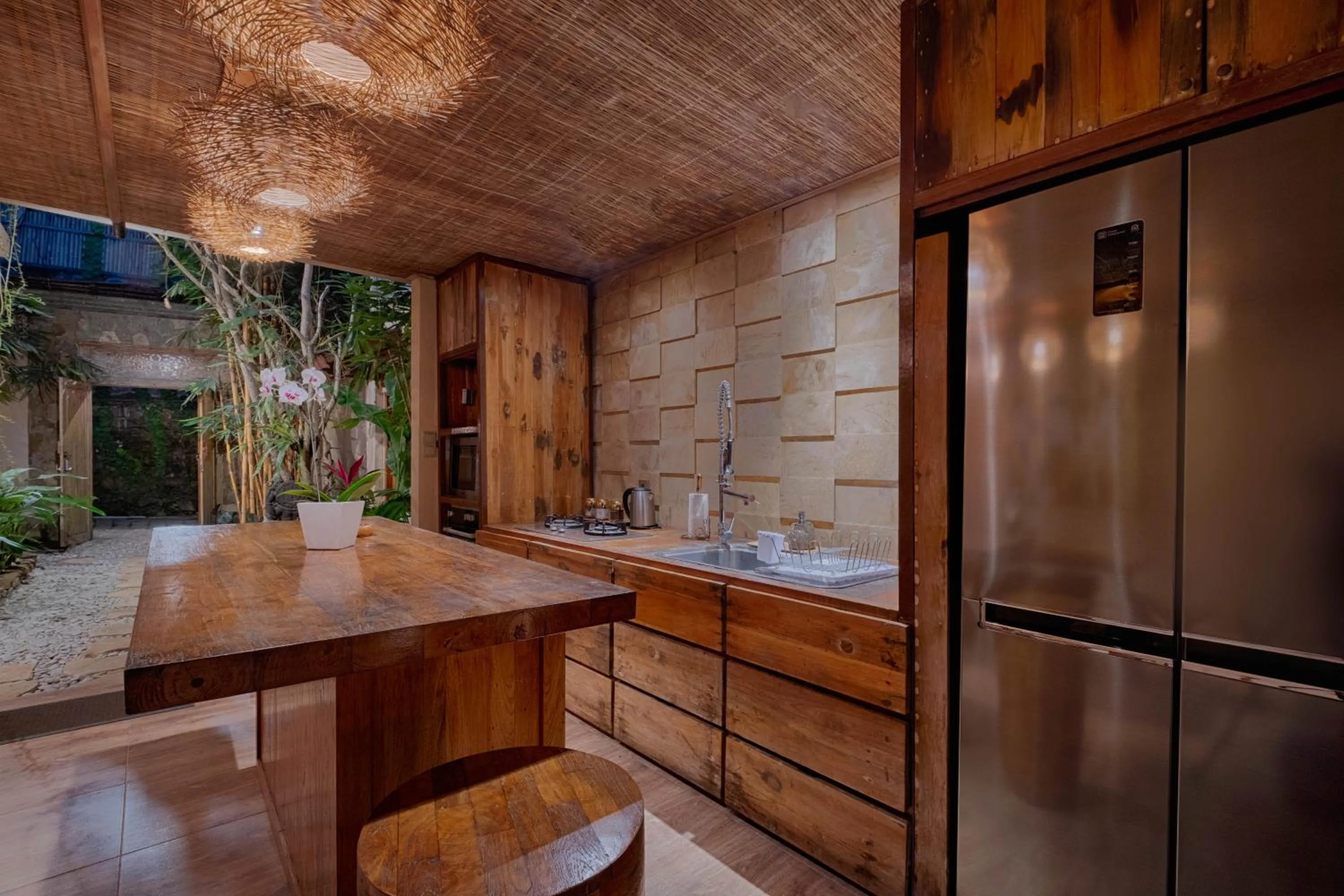 Kitchen or kitchenette in Mas Ubud Villa by Sanga Sanga Hospitality