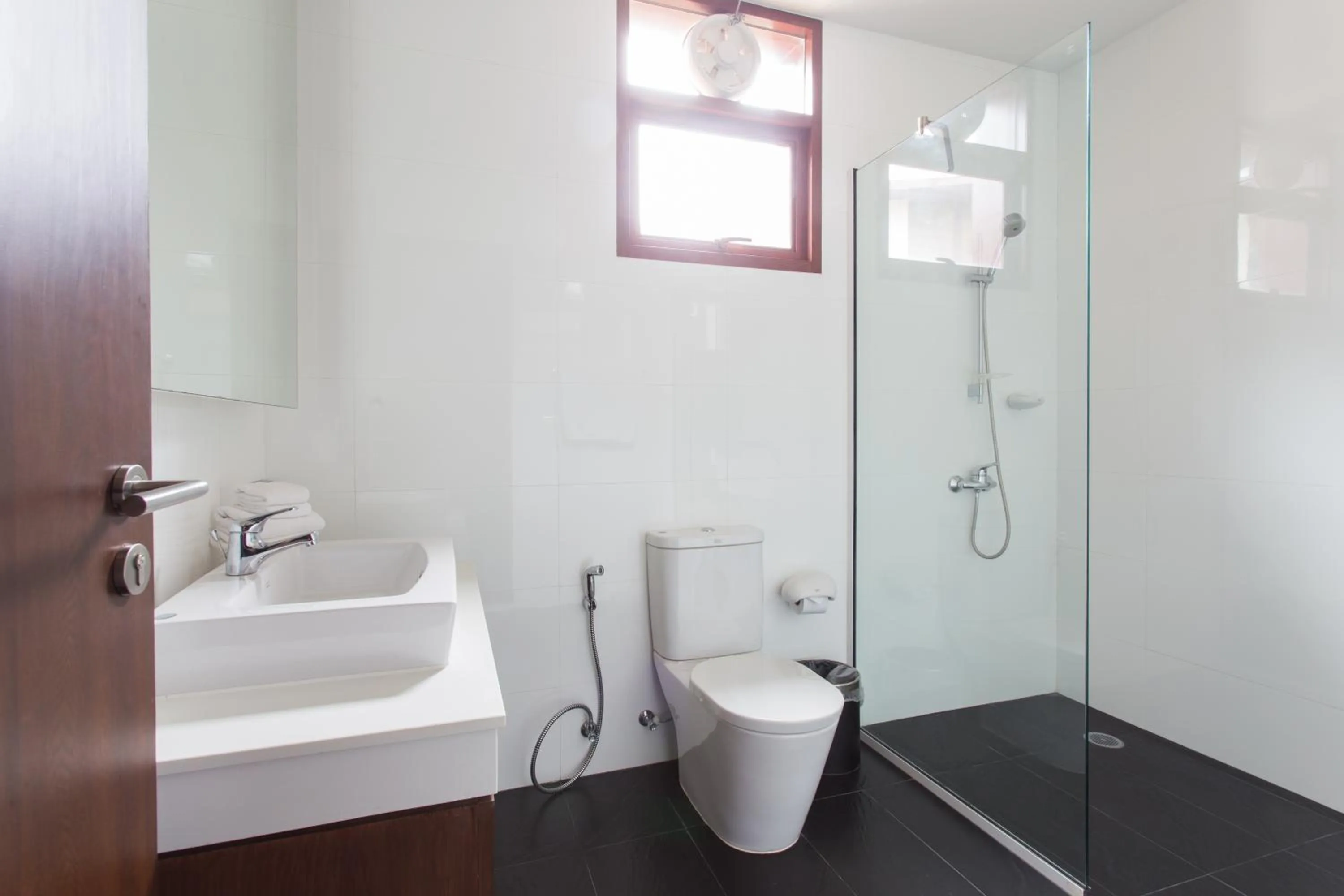 Bathroom in Amatapura Beachfront Villa 10 , SHA Certified