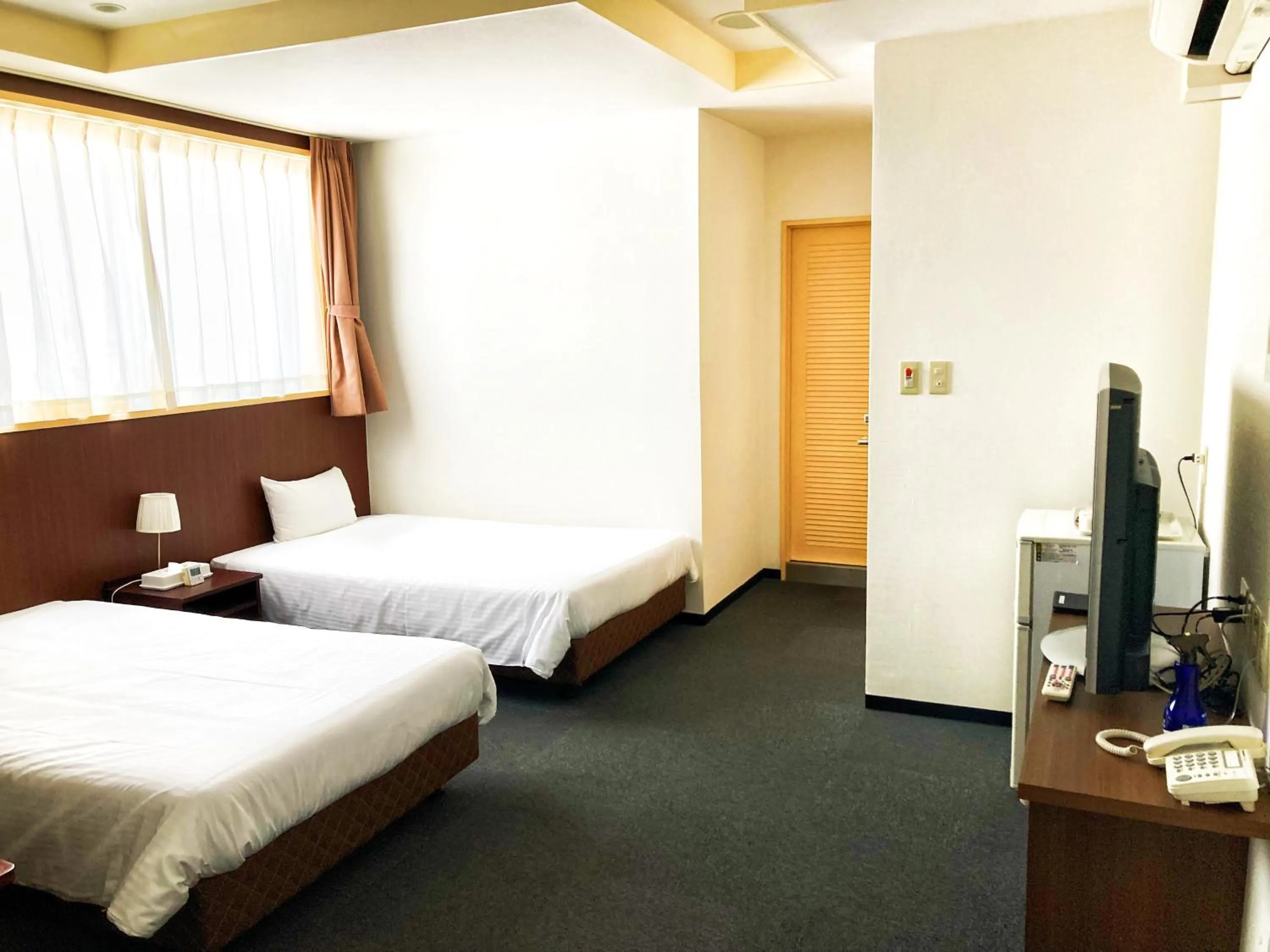 Photo of the whole room, Bed in Okinawa Hotel Precia