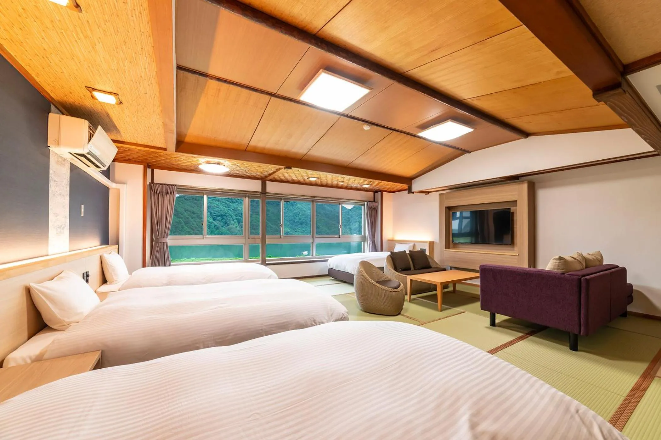 Photo of the whole room, Bed in Ooedo Onsen Monogatari Premium Kinosaki