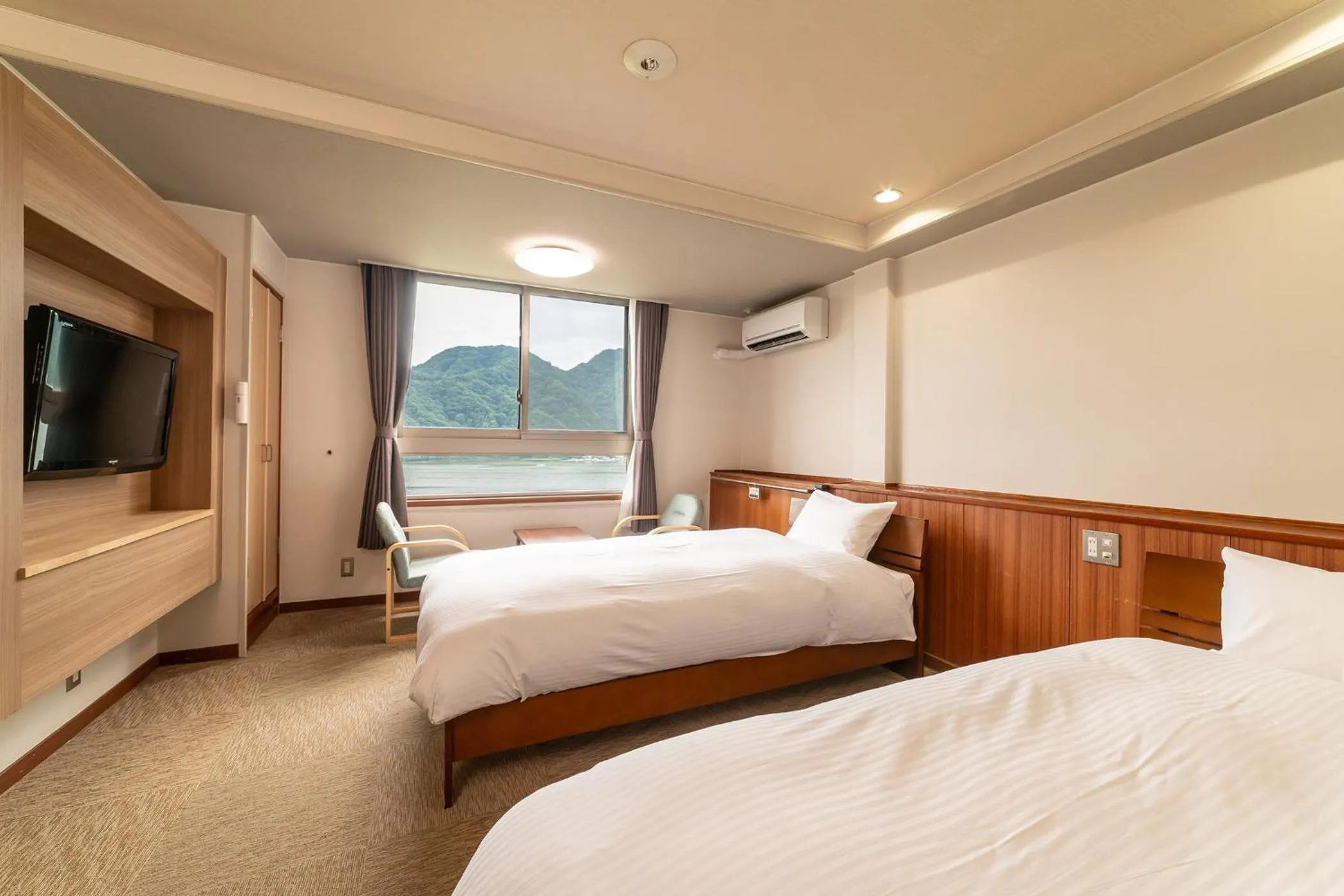 Photo of the whole room, Bed in Ooedo Onsen Monogatari Premium Kinosaki