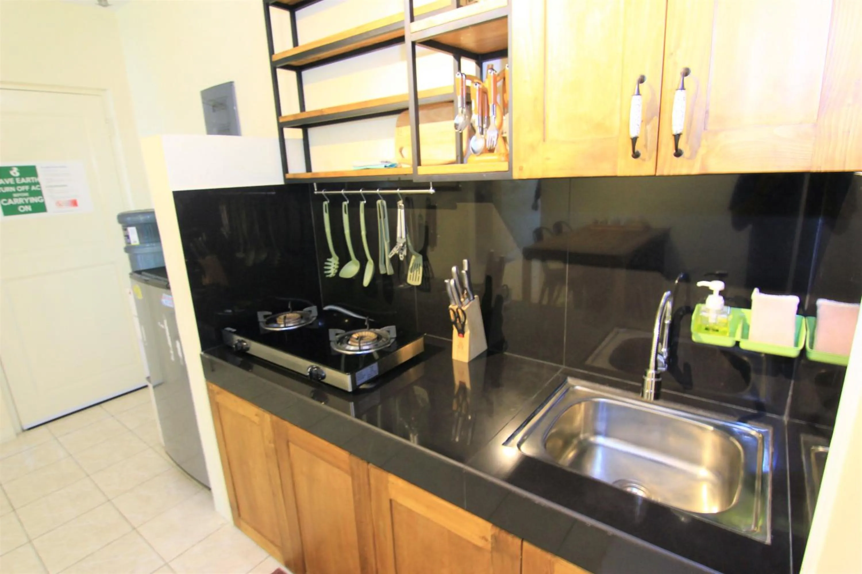 Kitchen or kitchenette in Queen Victoria Apartment Batam