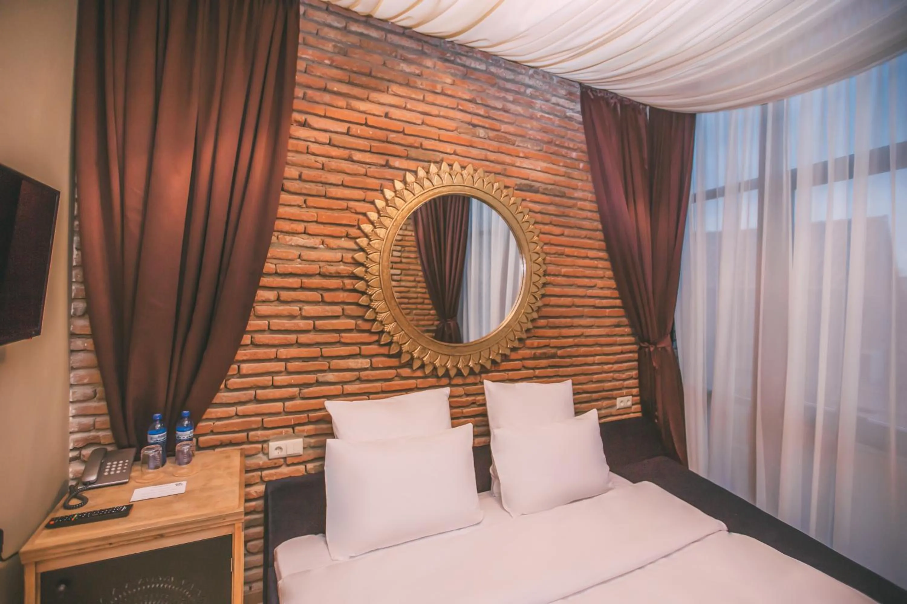 Landmark view, Bed in Kisi Boutique Hotel