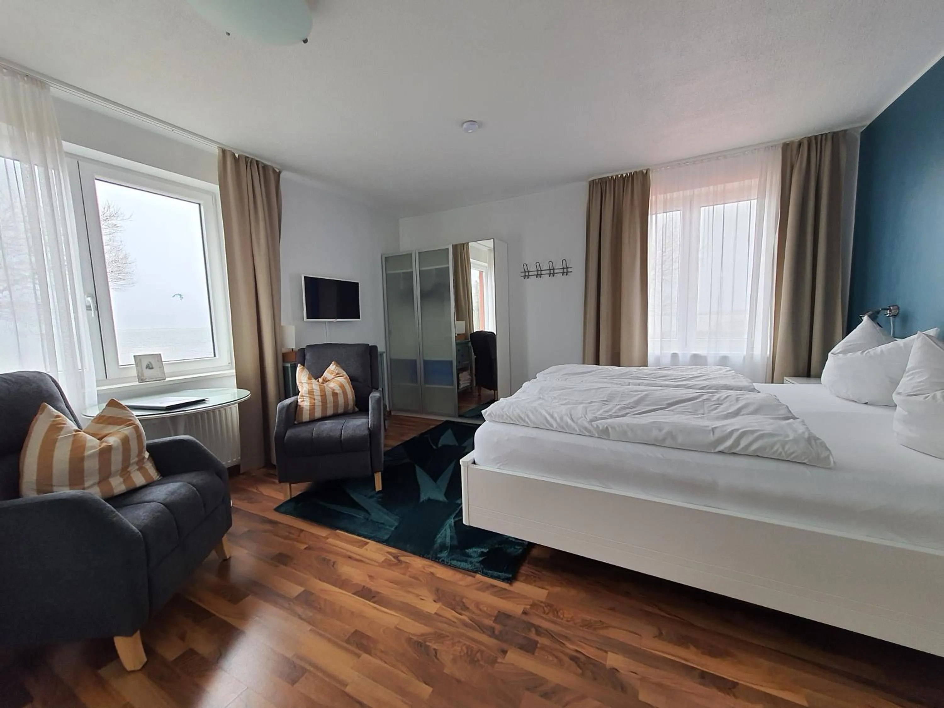 Bed in Haus Achtern Diek in erster Reihe am Meer