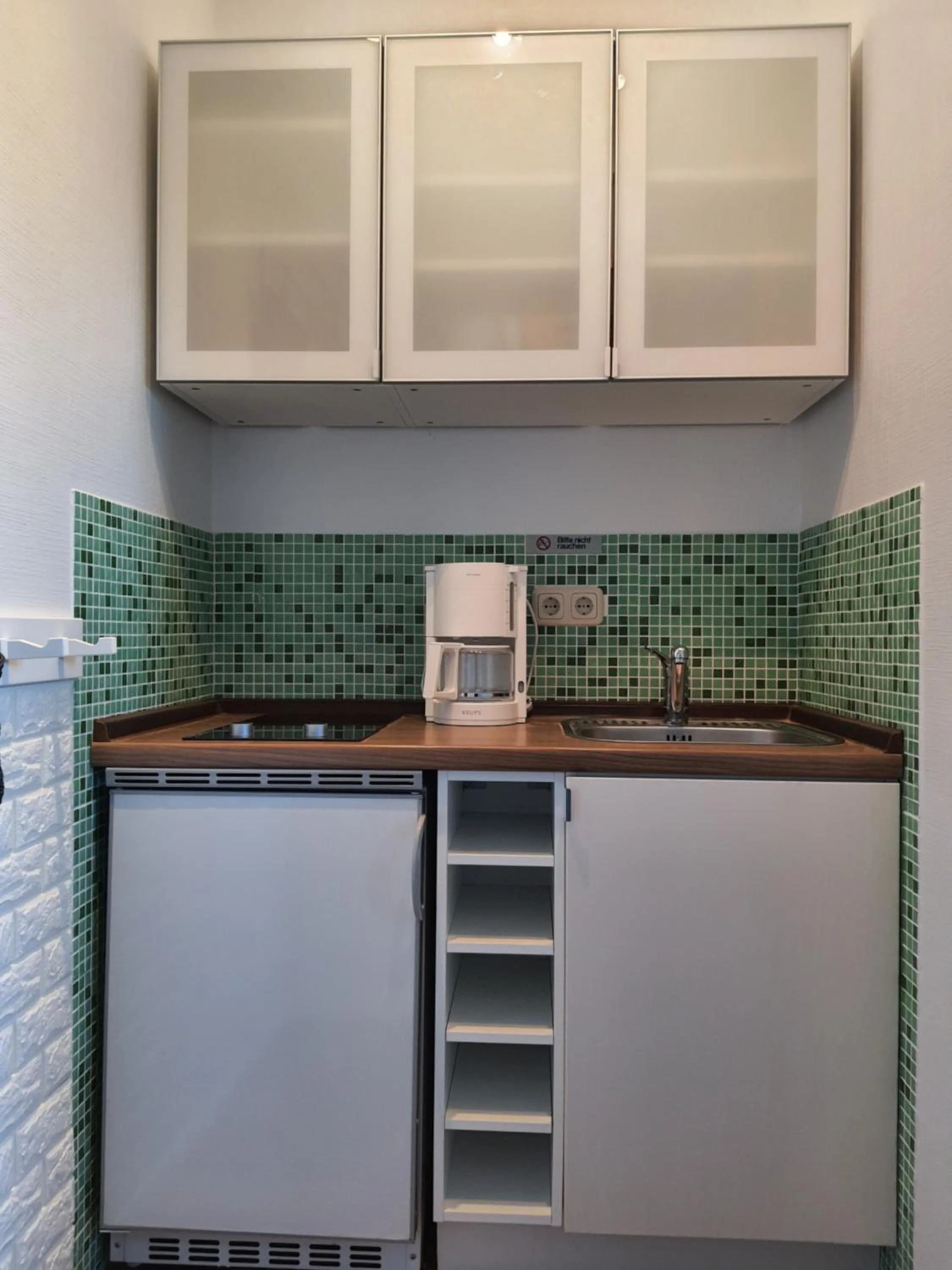 Kitchen or kitchenette in Haus Achtern Diek in erster Reihe am Meer