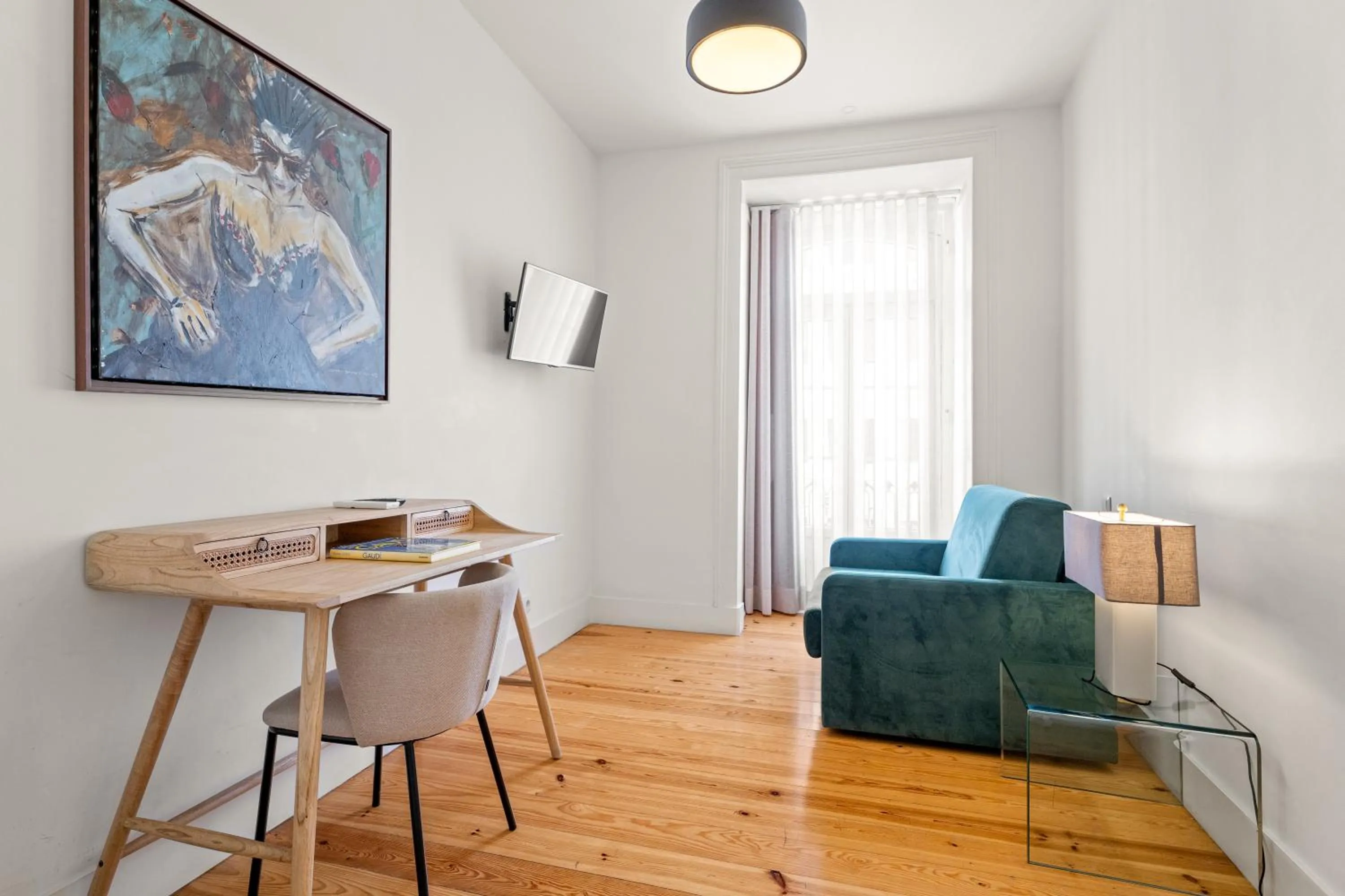 Living room in Tesouro da Baixa by Shiadu