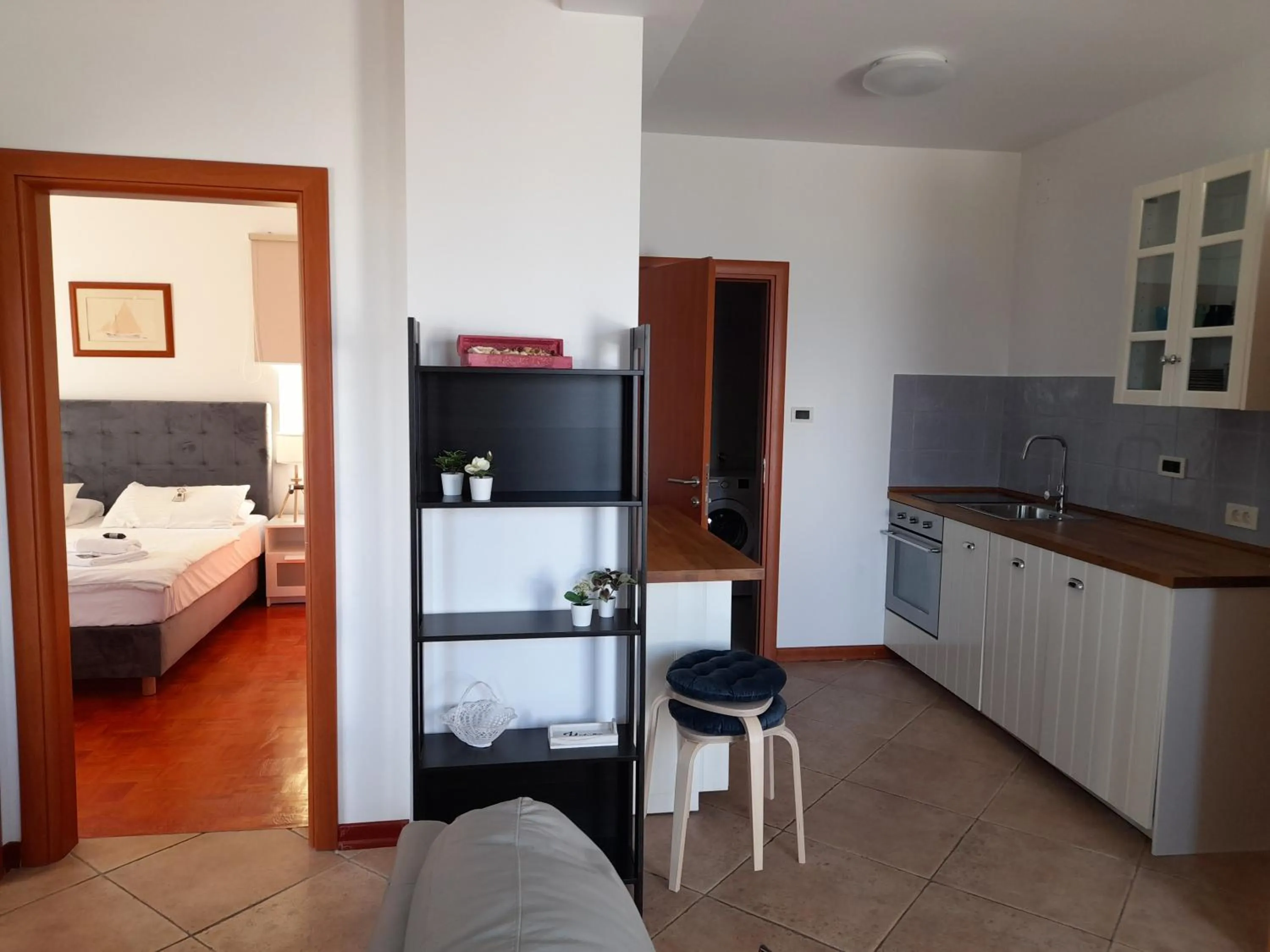 Kitchen or kitchenette, Bed in Hotel Manora