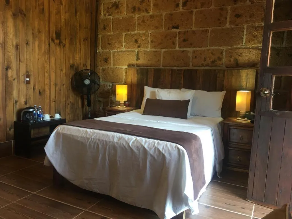 Bed in Hotel Real Nirvana