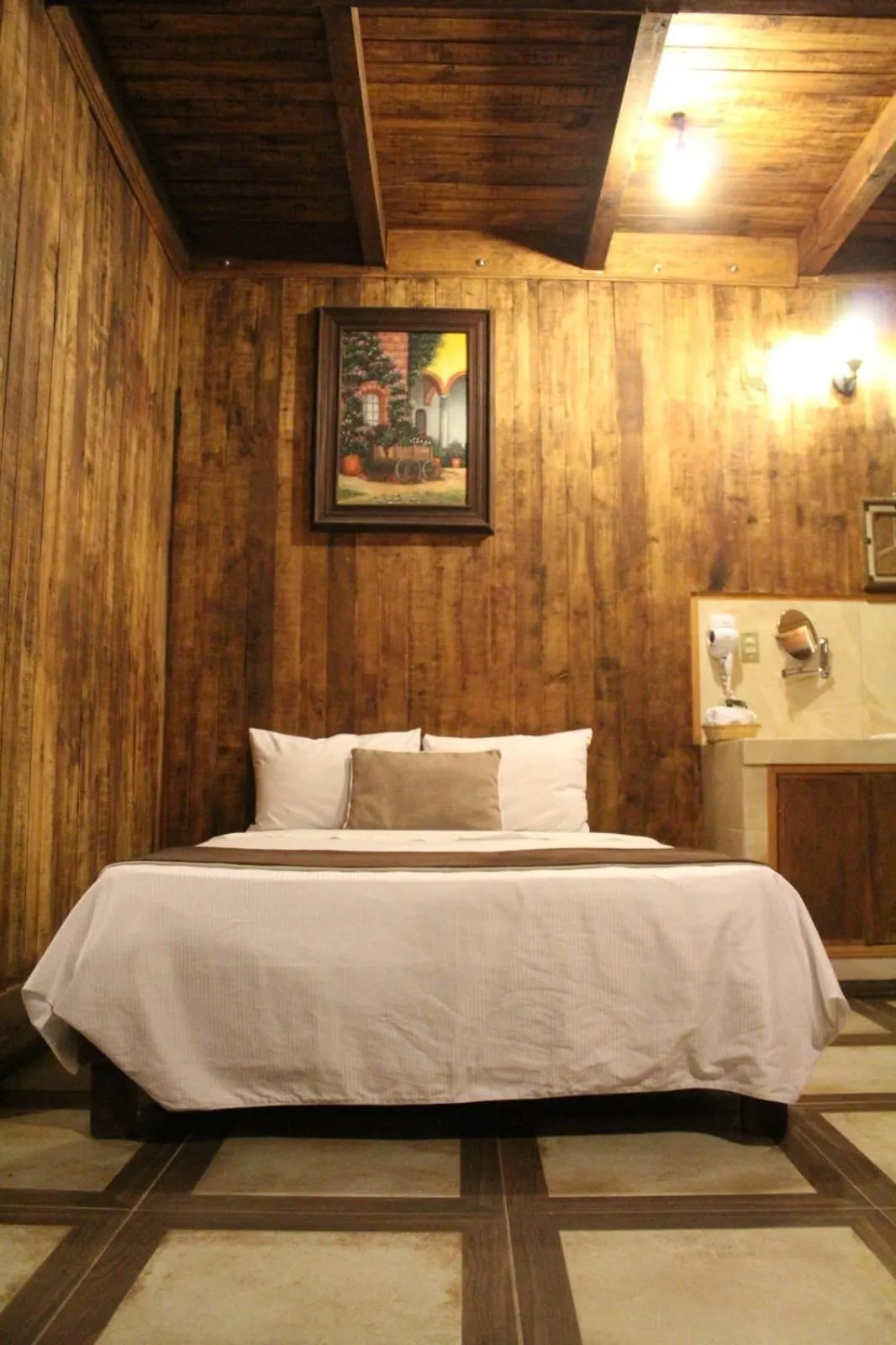 Bed in Hotel Real Nirvana