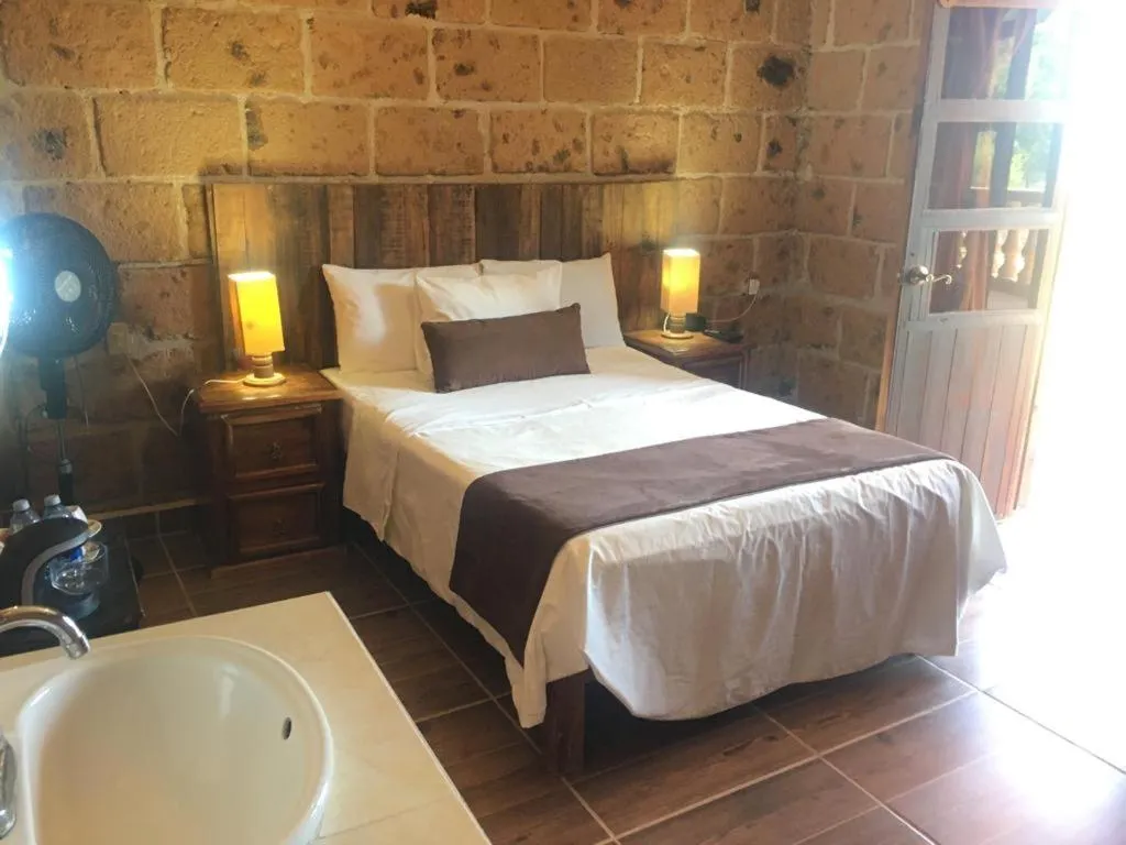 Bed in Hotel Real Nirvana