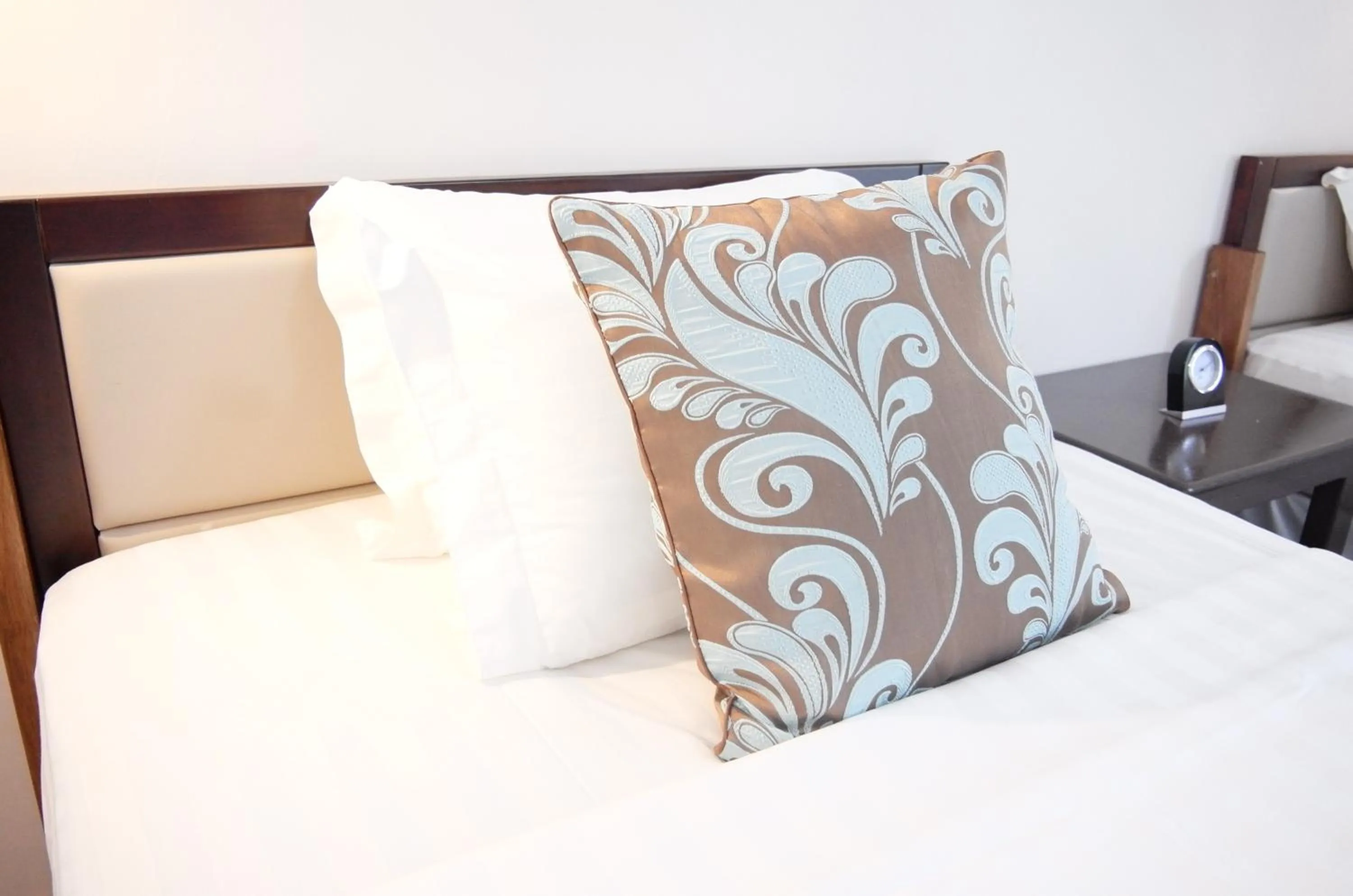 Bed in Luganvilla Business Hotel and Restaurant