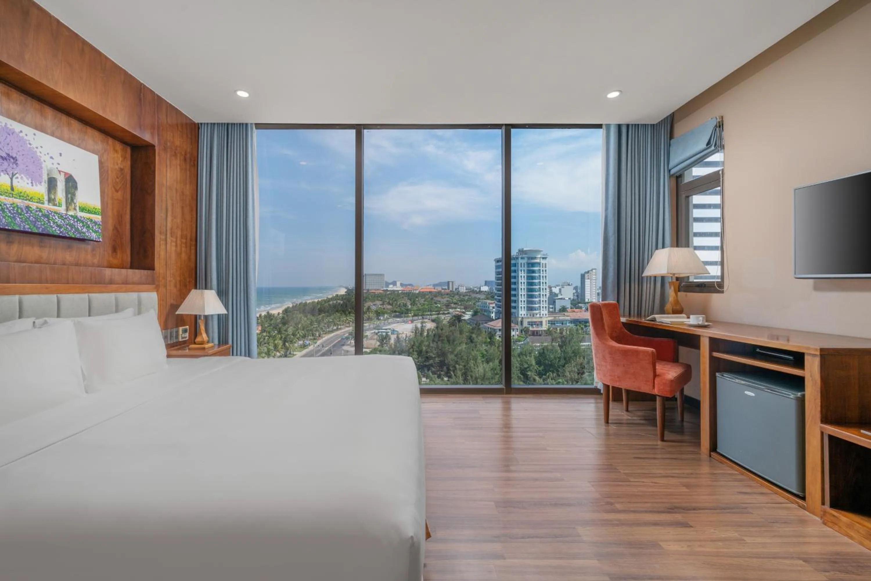 Bed in Yarra Ocean Suites Danang