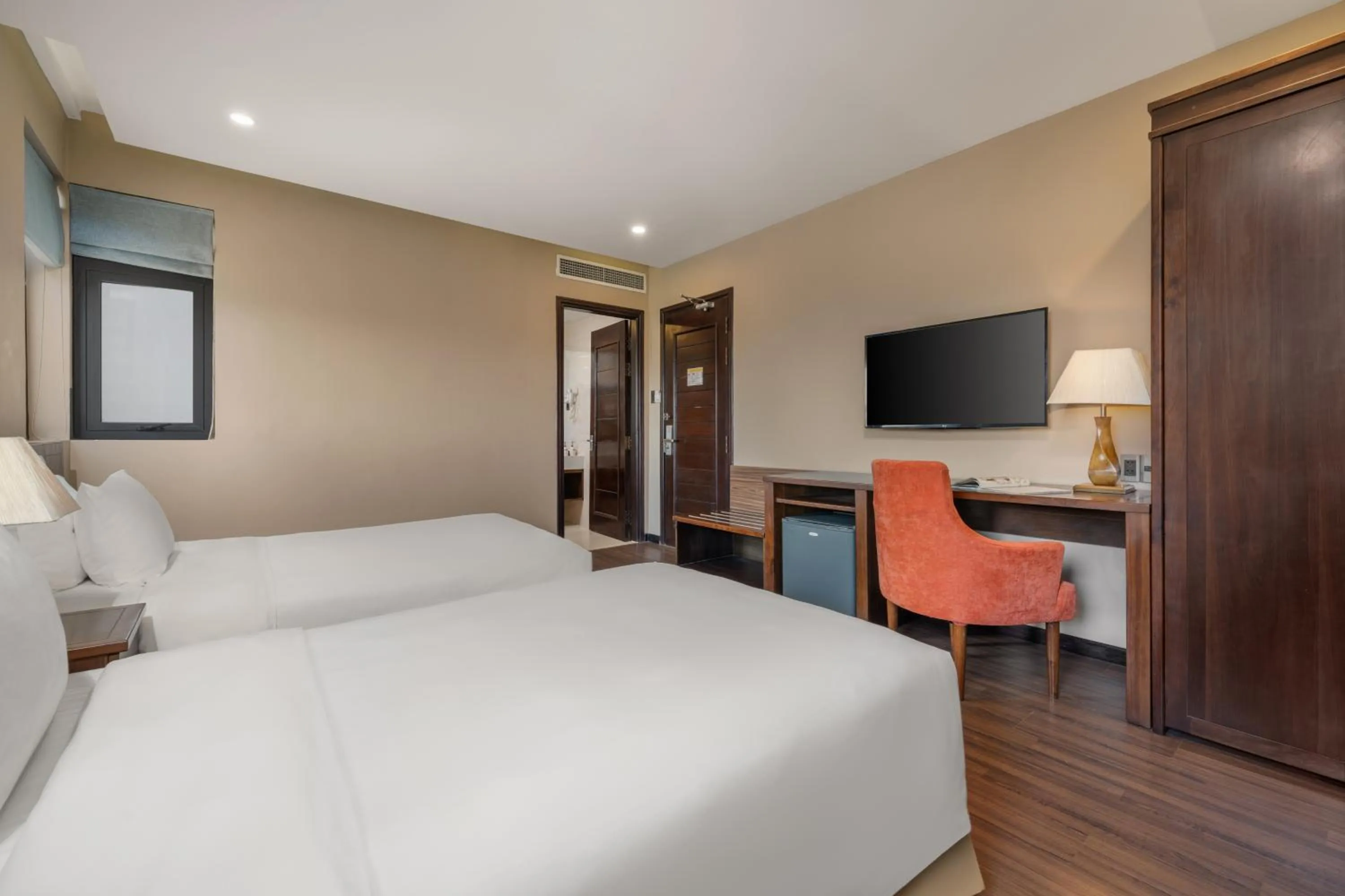 Bed in Yarra Ocean Suites Danang