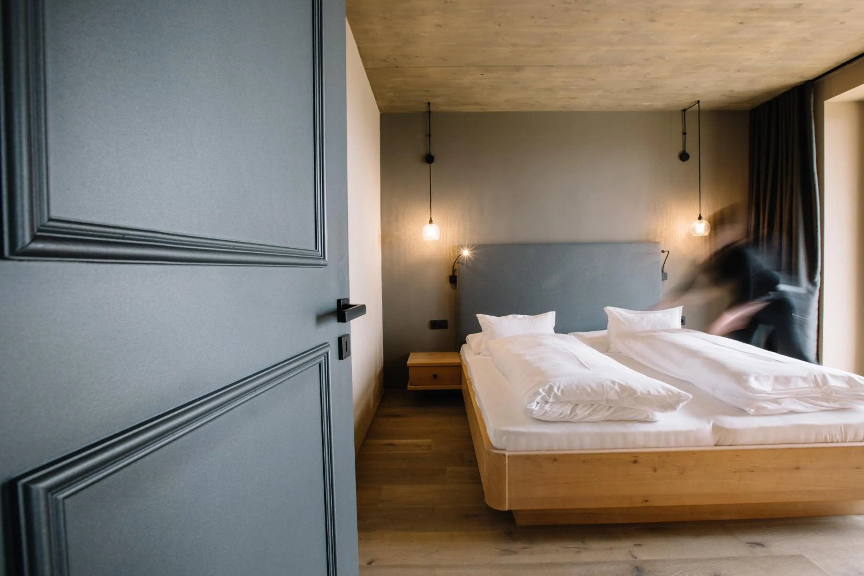 Bed in Panoramic Suites Winzerhöhe