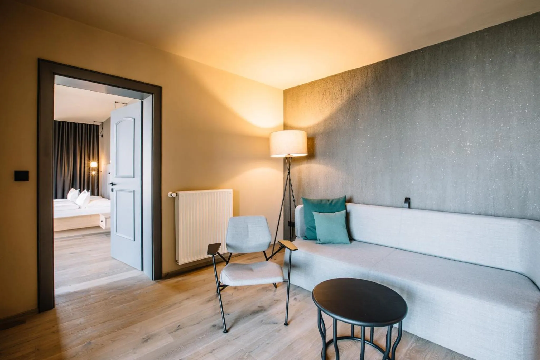 Living room, Bed in Panoramic Suites Winzerhöhe