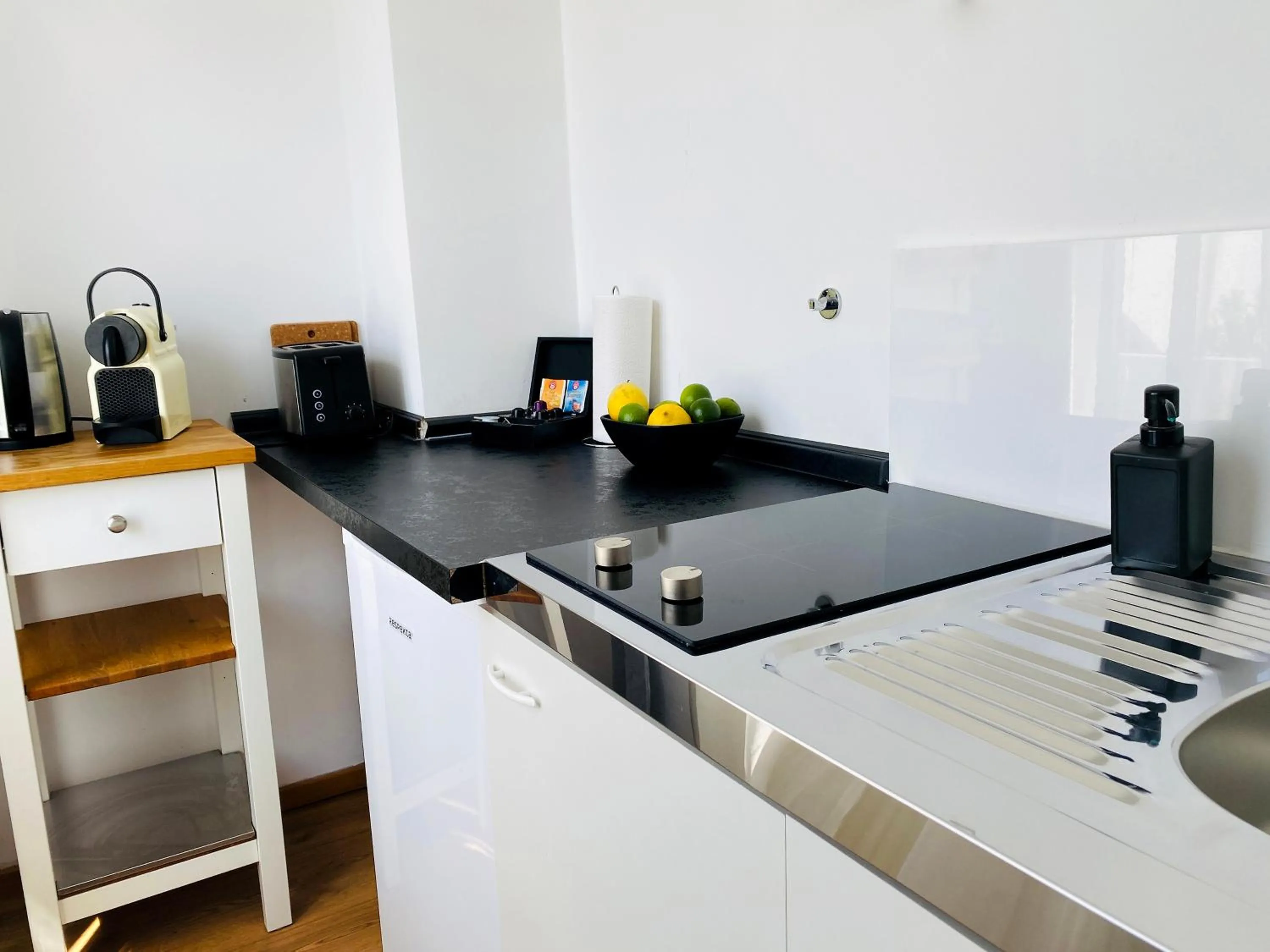 Kitchen or kitchenette in Victoria Apartments