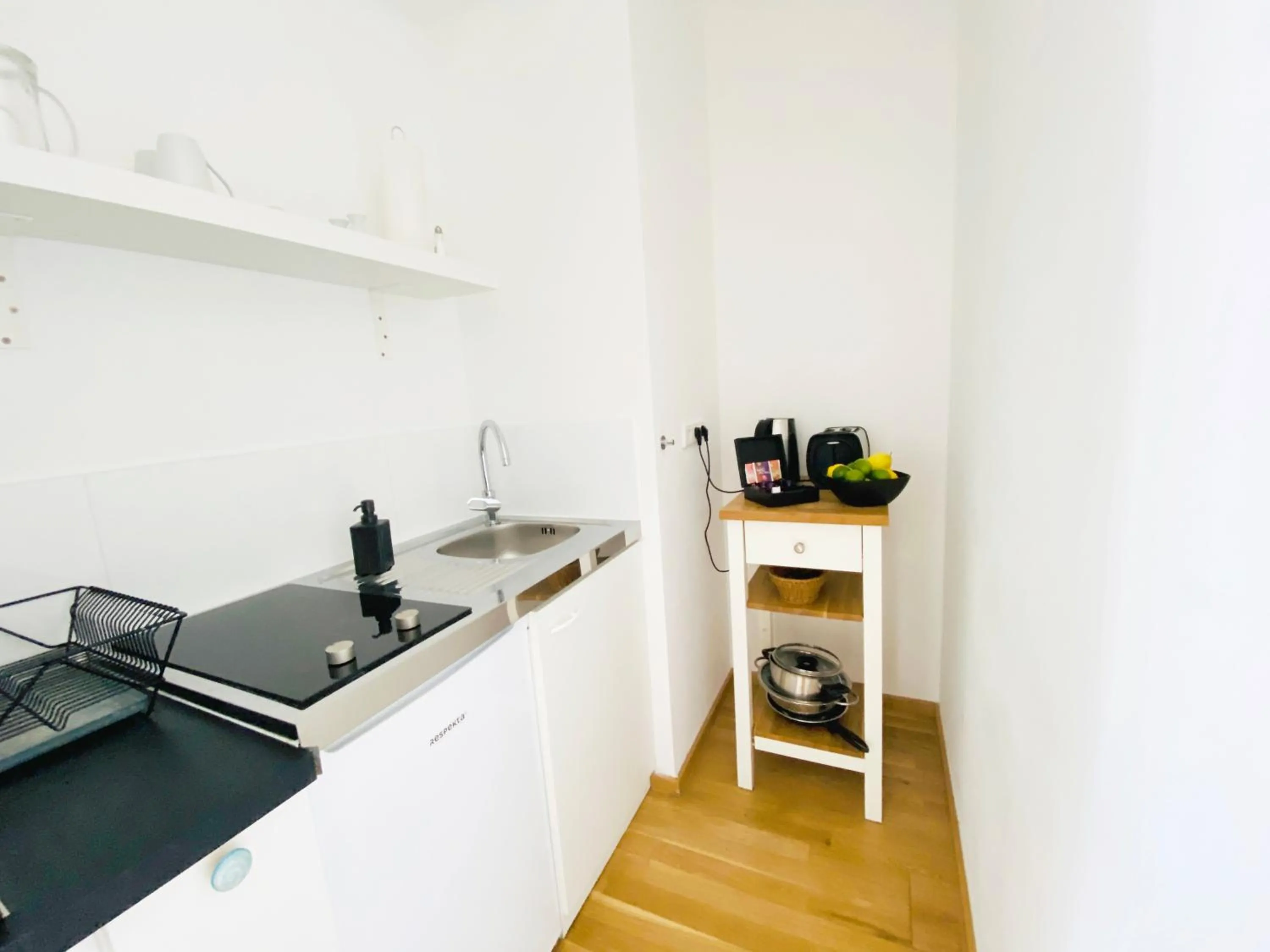 Kitchen or kitchenette in Victoria Apartments