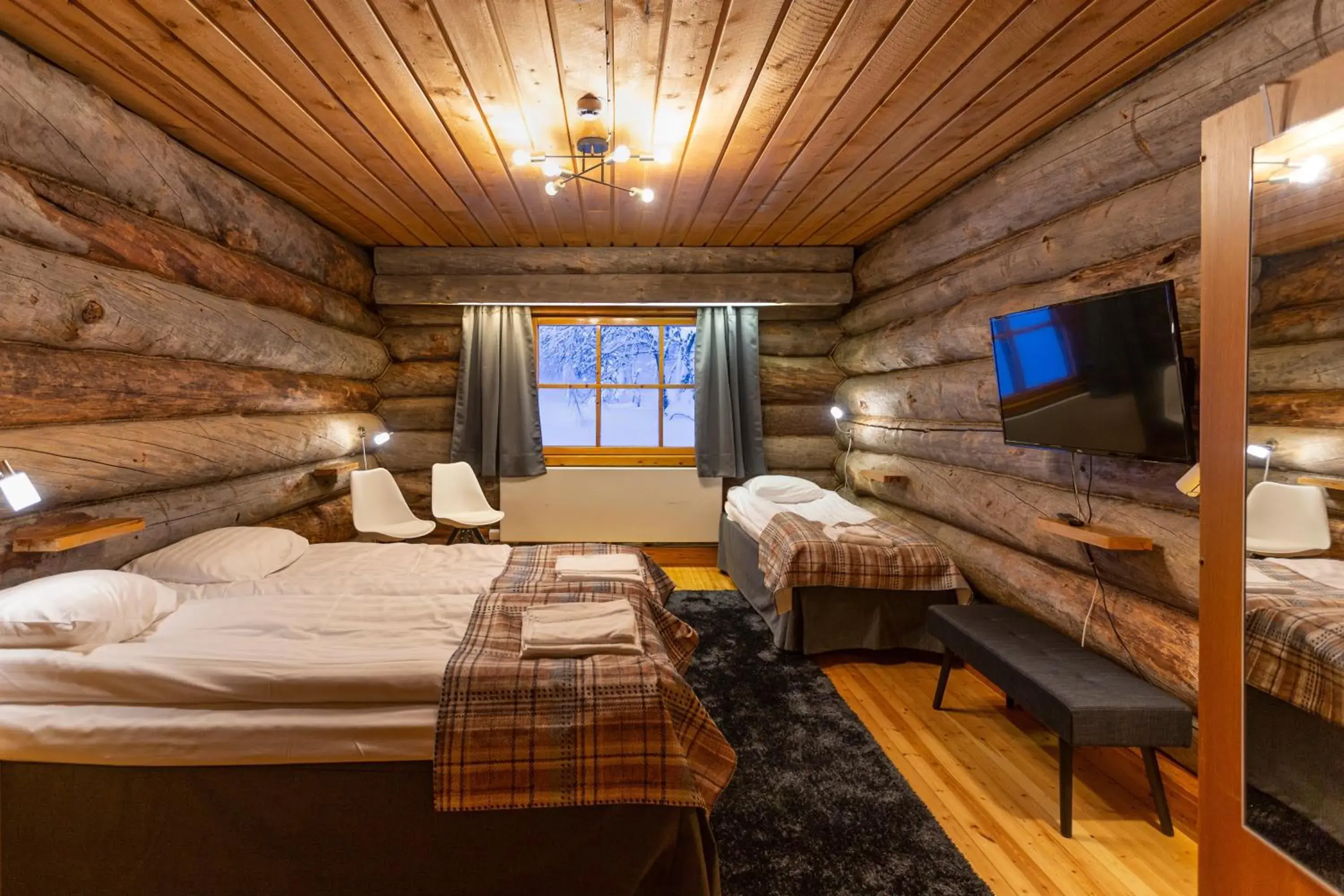 Triple Room with Shared Bathroom in Kuukkeli Log Houses Aurora Resort Triple Room with Shared Bathroom in Kuukkeli Log Houses Aurora Resort