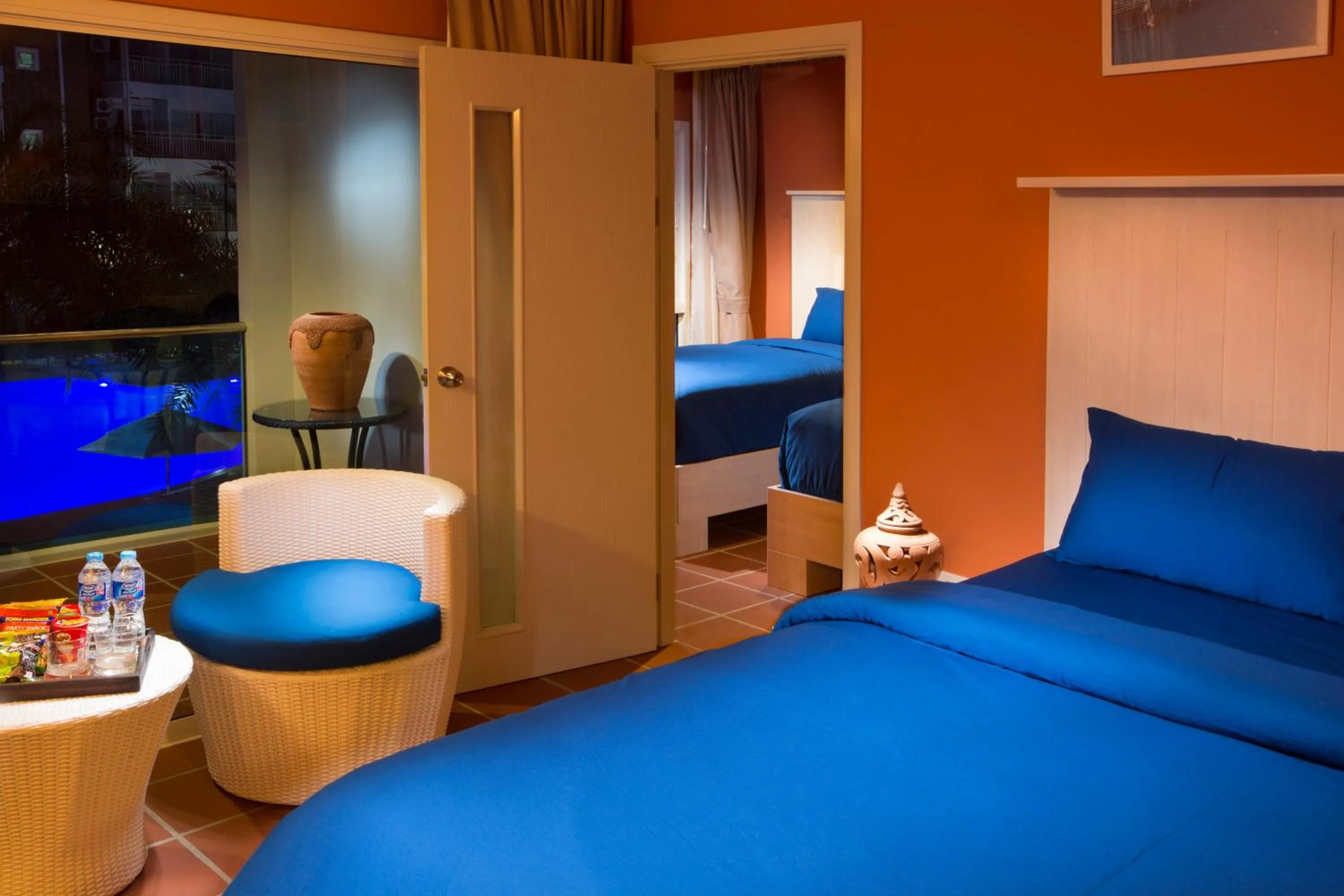 Bed in GrandBlue Resort & Beachclub