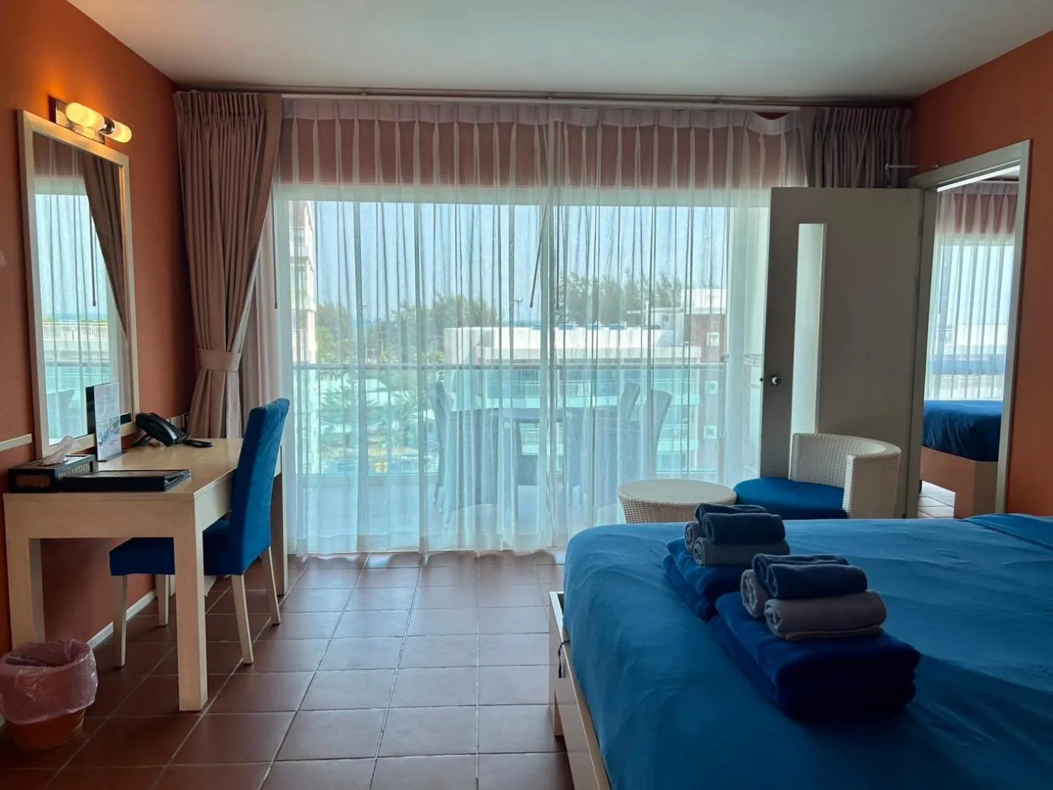 Bed in GrandBlue Resort & Beachclub