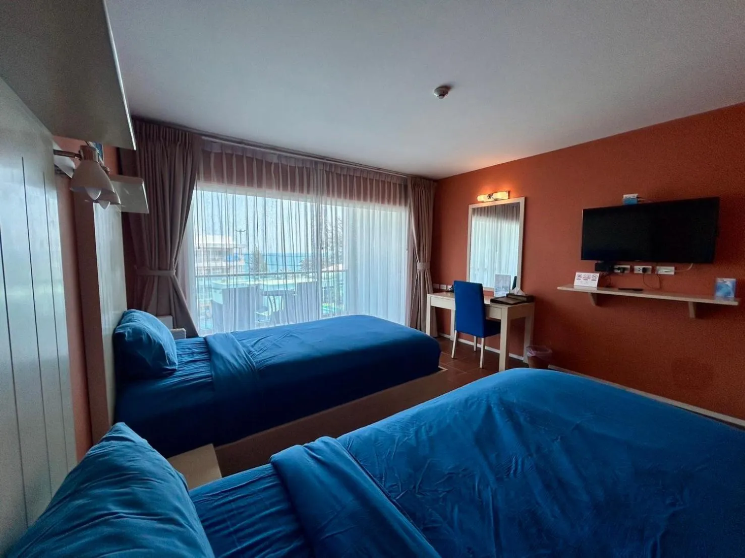 Bed in GrandBlue Resort & Beachclub