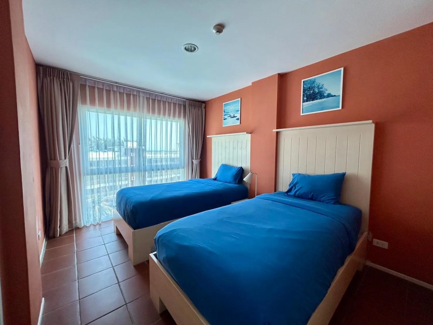 Bed in GrandBlue Resort & Beachclub