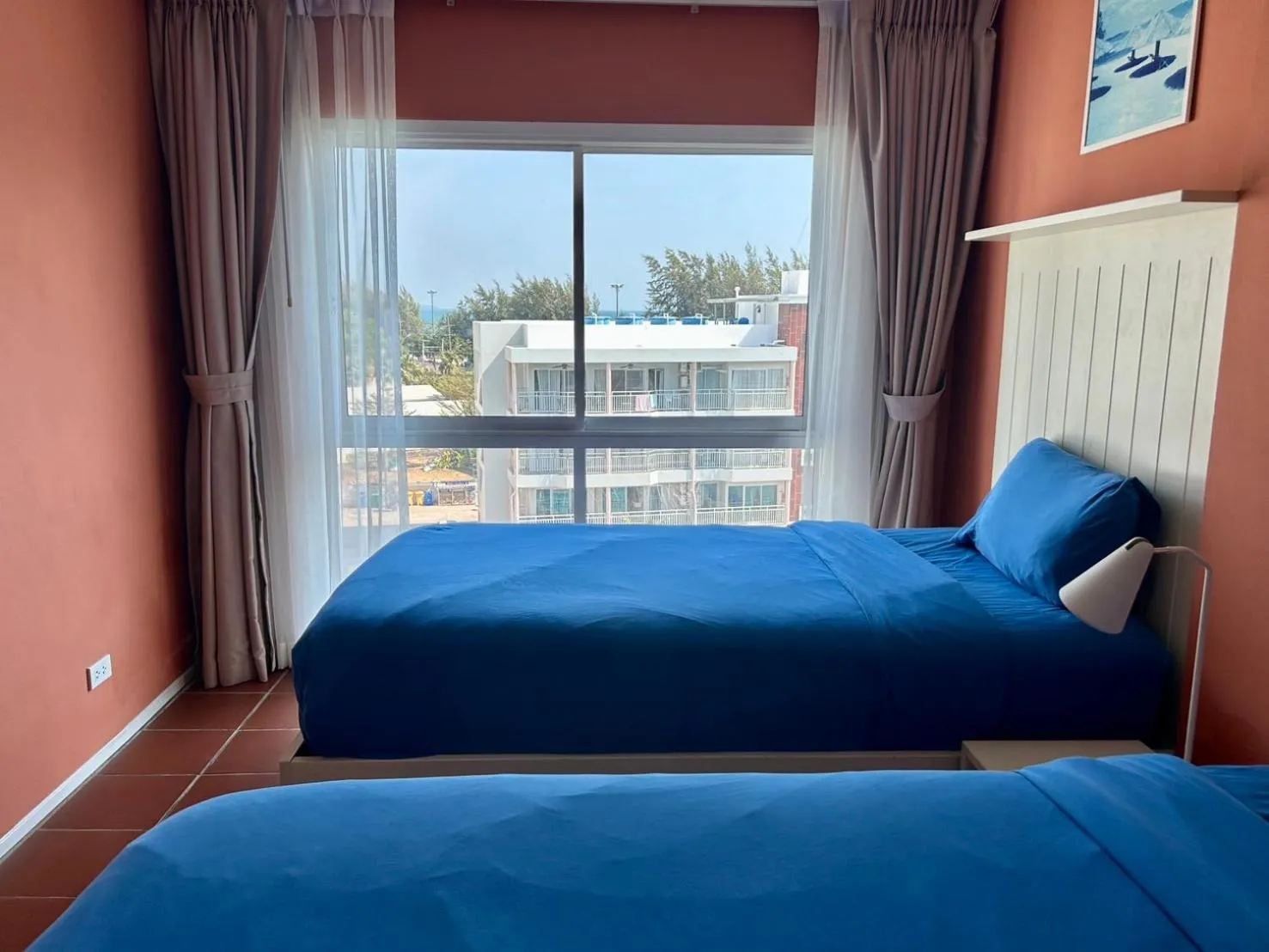 Bed in GrandBlue Resort & Beachclub