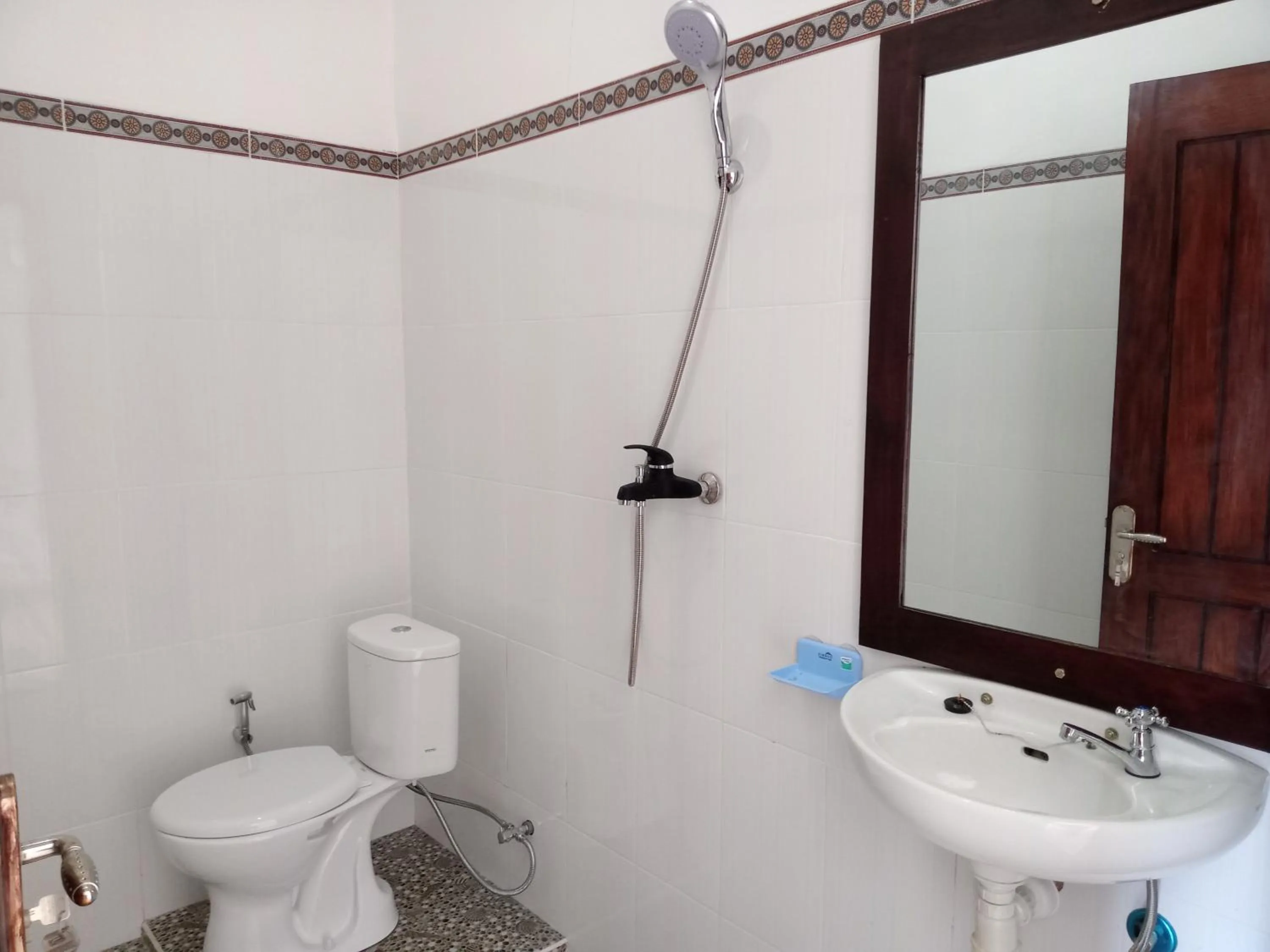 Toilet in Aris Homestay and Warung Made