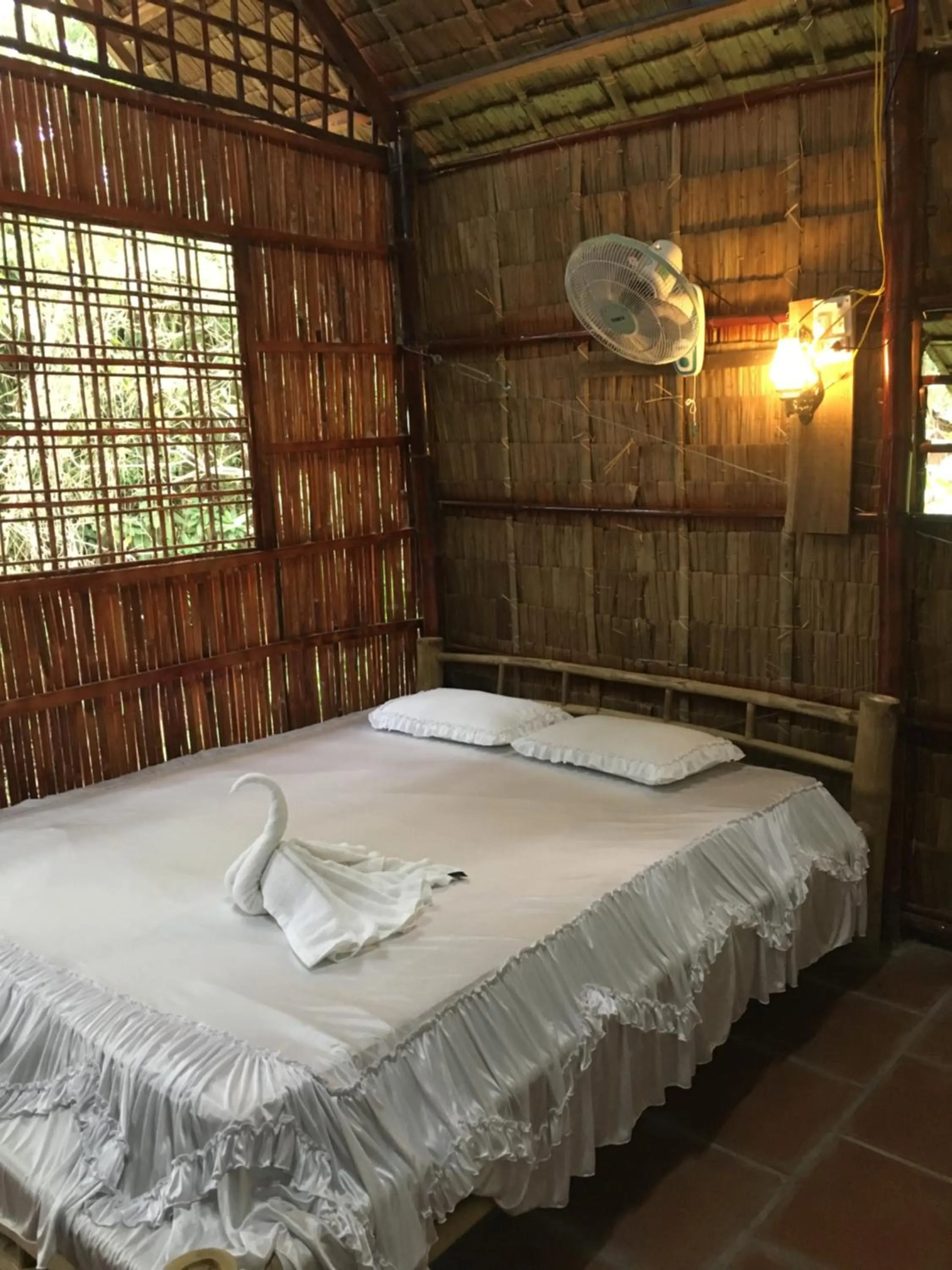 Bed in Chau Doc Homestay