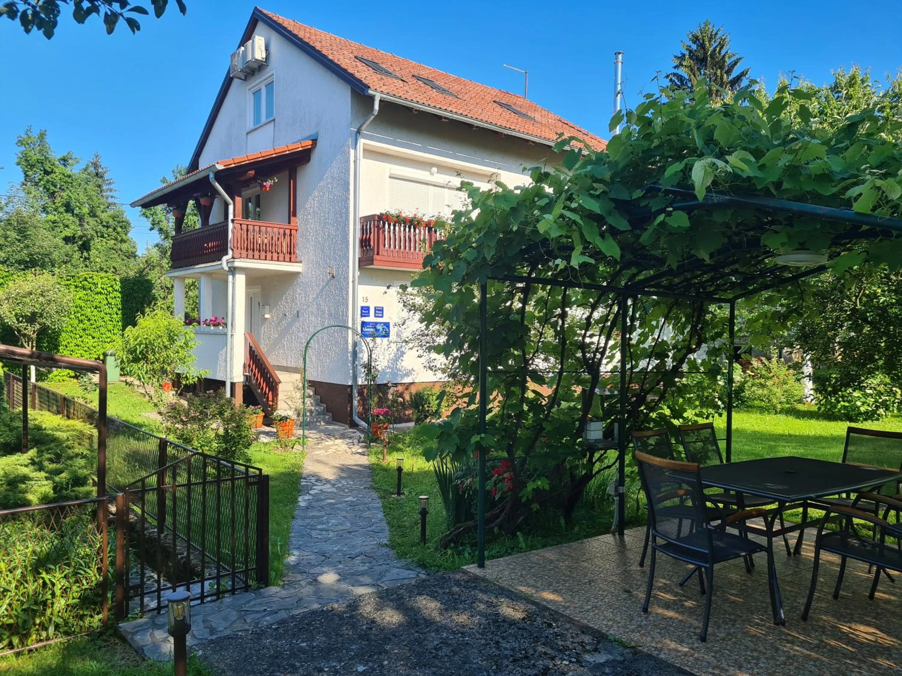 Property building in Rooms Garden