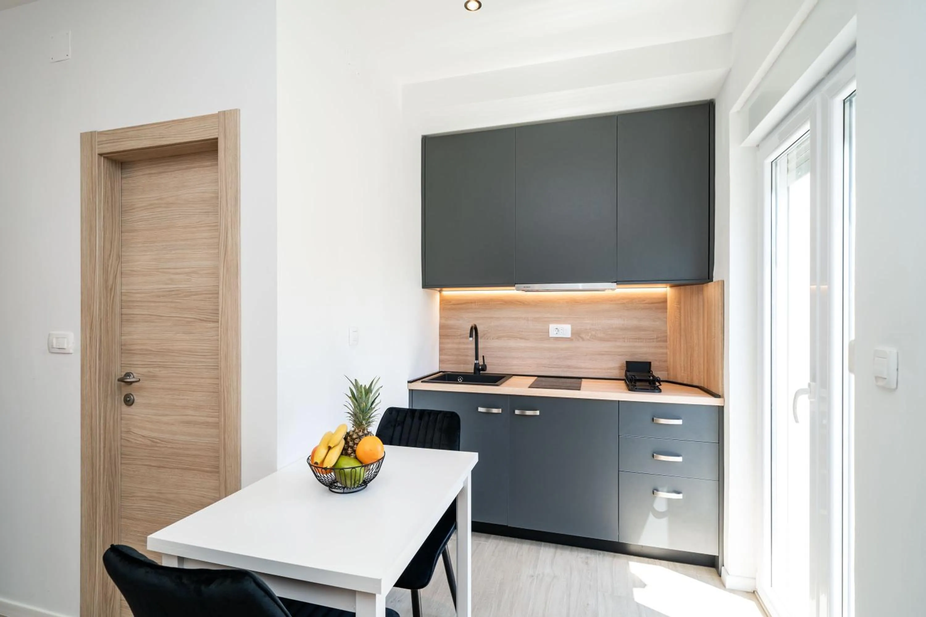 Kitchen or kitchenette in Bacan Serviced Apartments