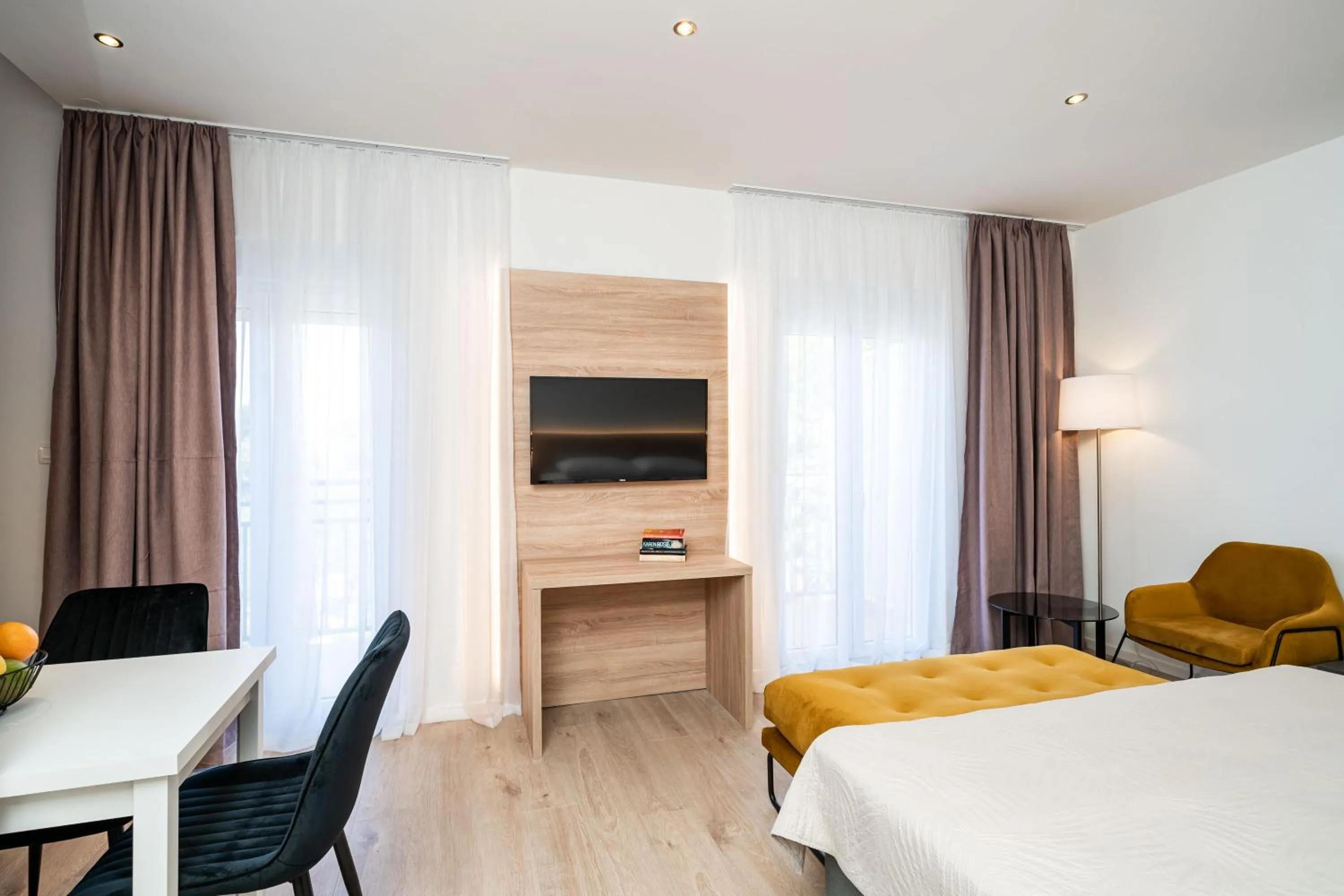 TV and multimedia, Bed in Bacan Serviced Apartments