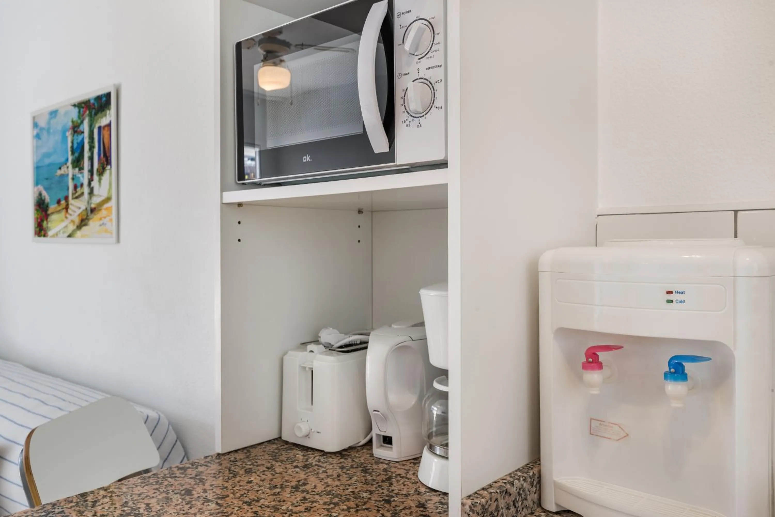 Kitchen or kitchenette in Calypso Oasis Apartments