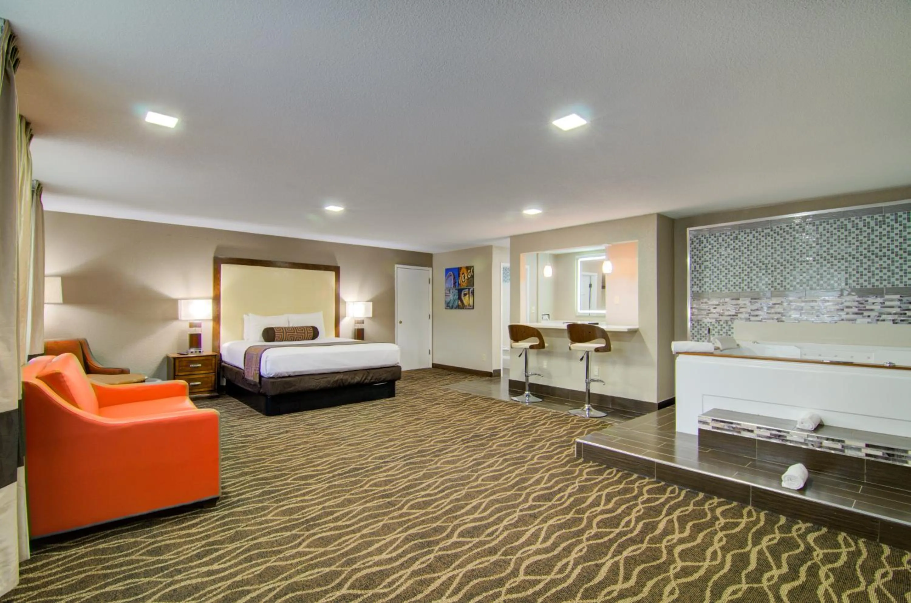 Bed in Westbridge Inn and Suites