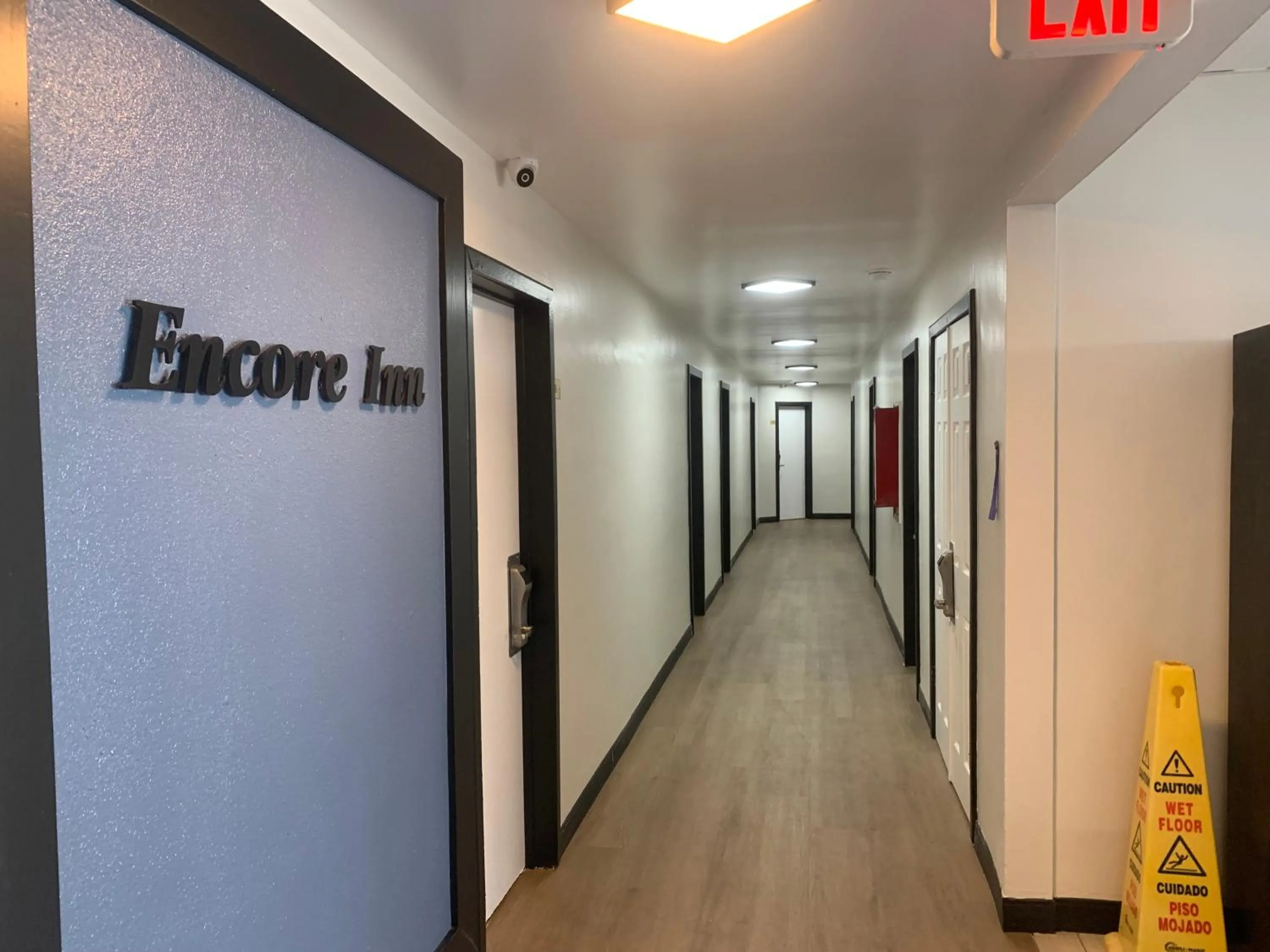 Property logo or sign in Encore Inn Inglewood