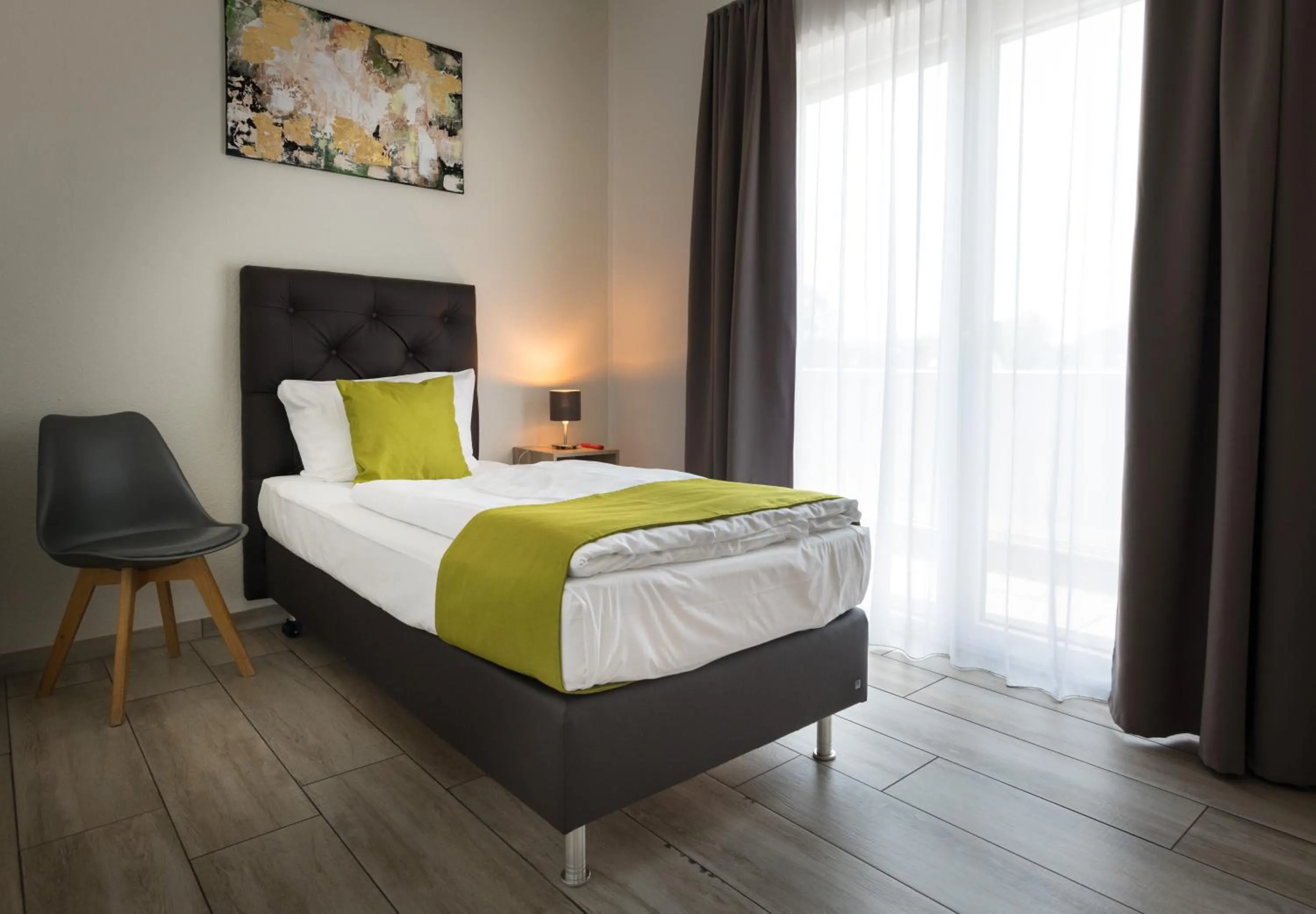 Bedroom, Bed in GLEUEL INN - digital hotel & serviced apartments & boardinghouse mit voll ausgestatteten Küchen