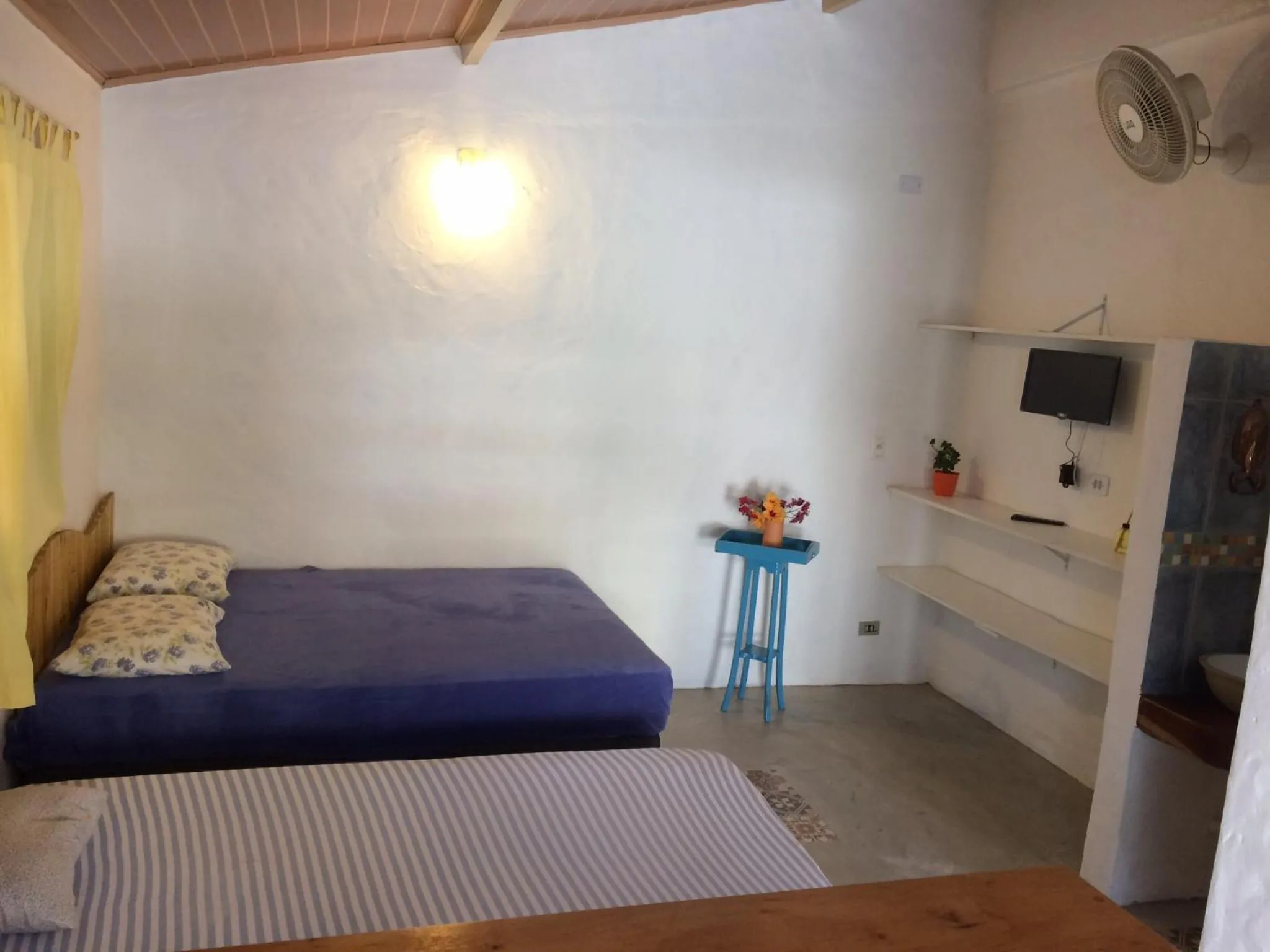 Bed in Kitchenette Charmosa no Itagua