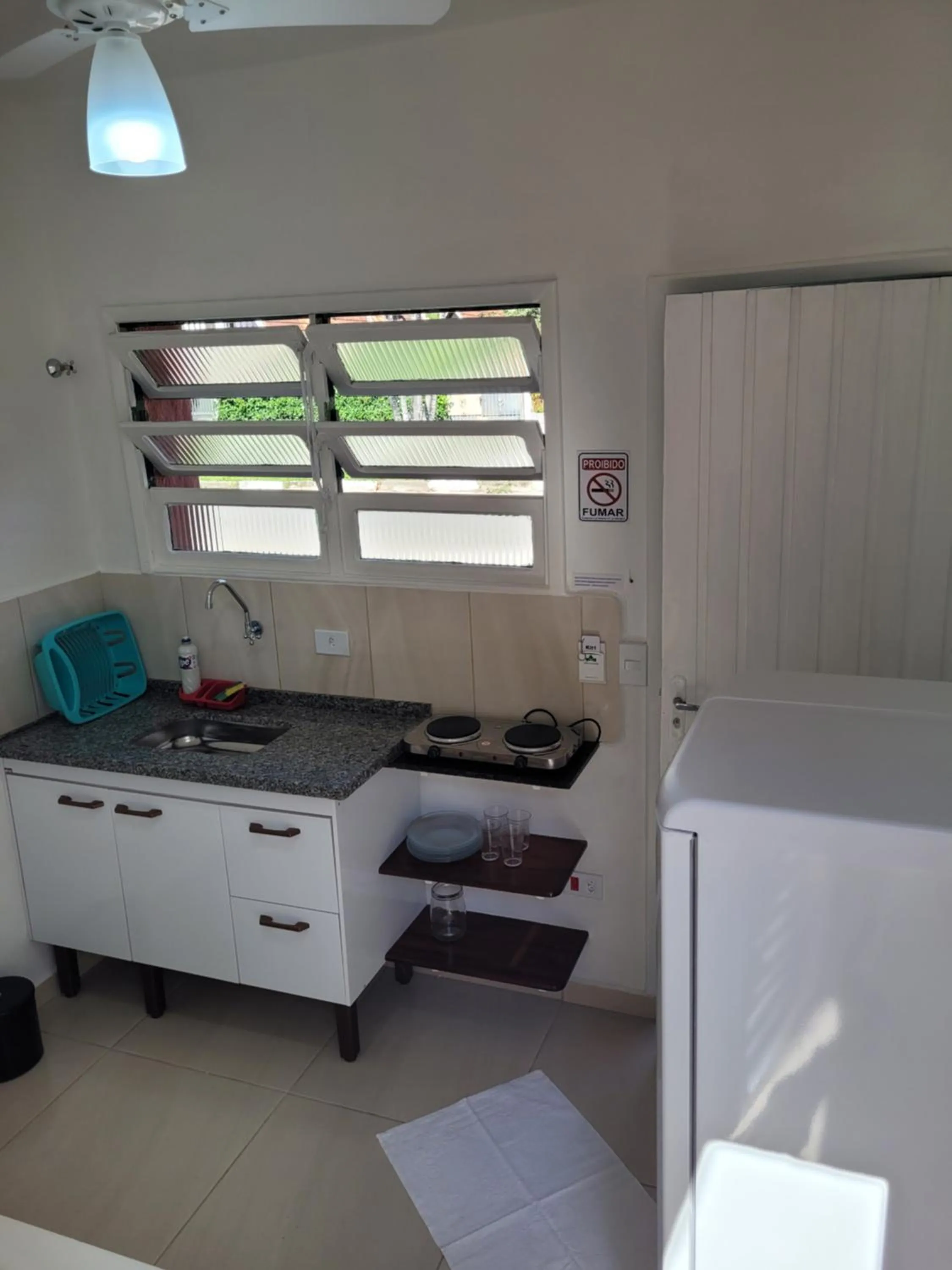 Bed in Kitchenette Charmosa no Itagua