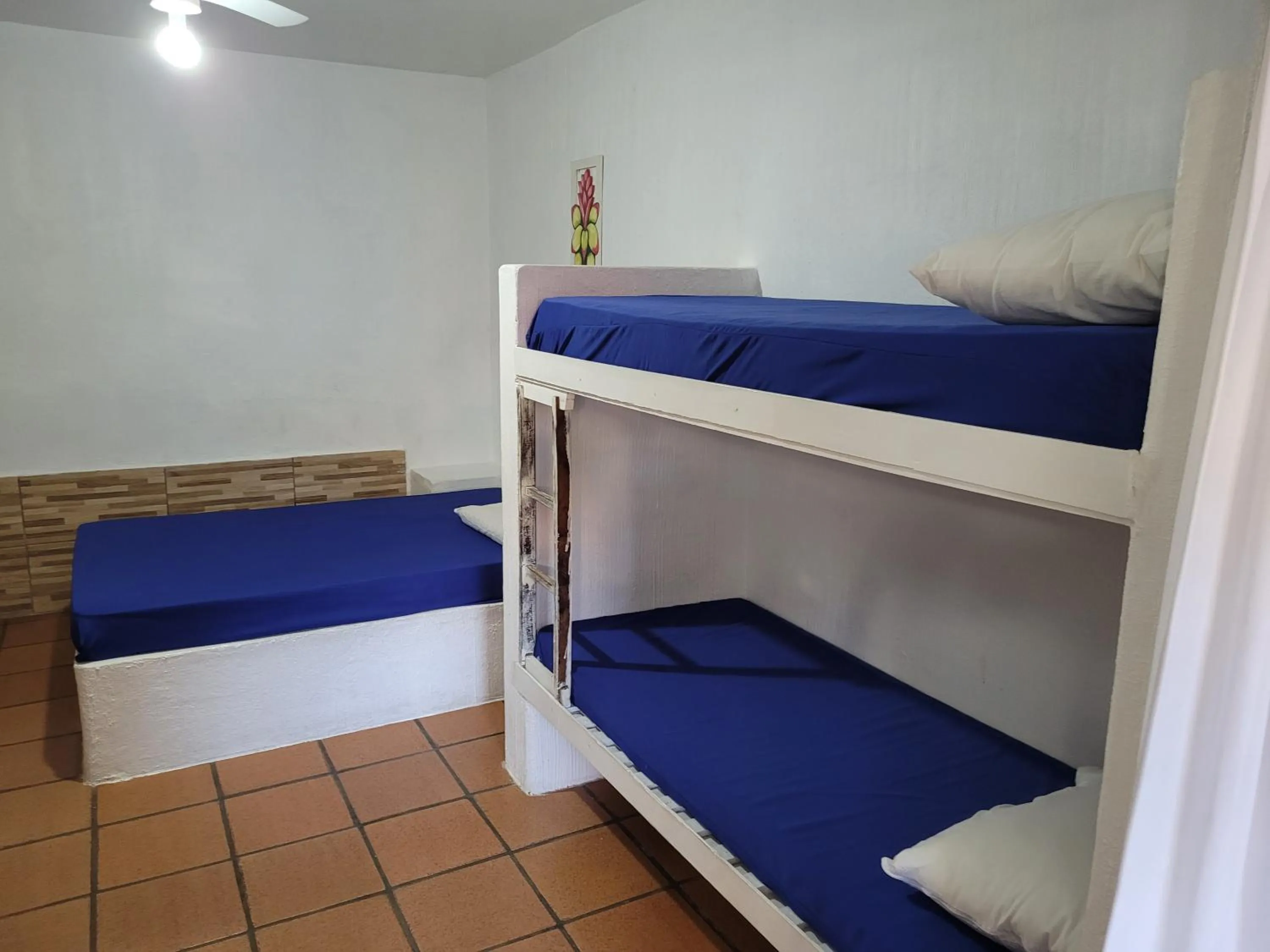 Bed in Kitchenette Charmosa no Itagua