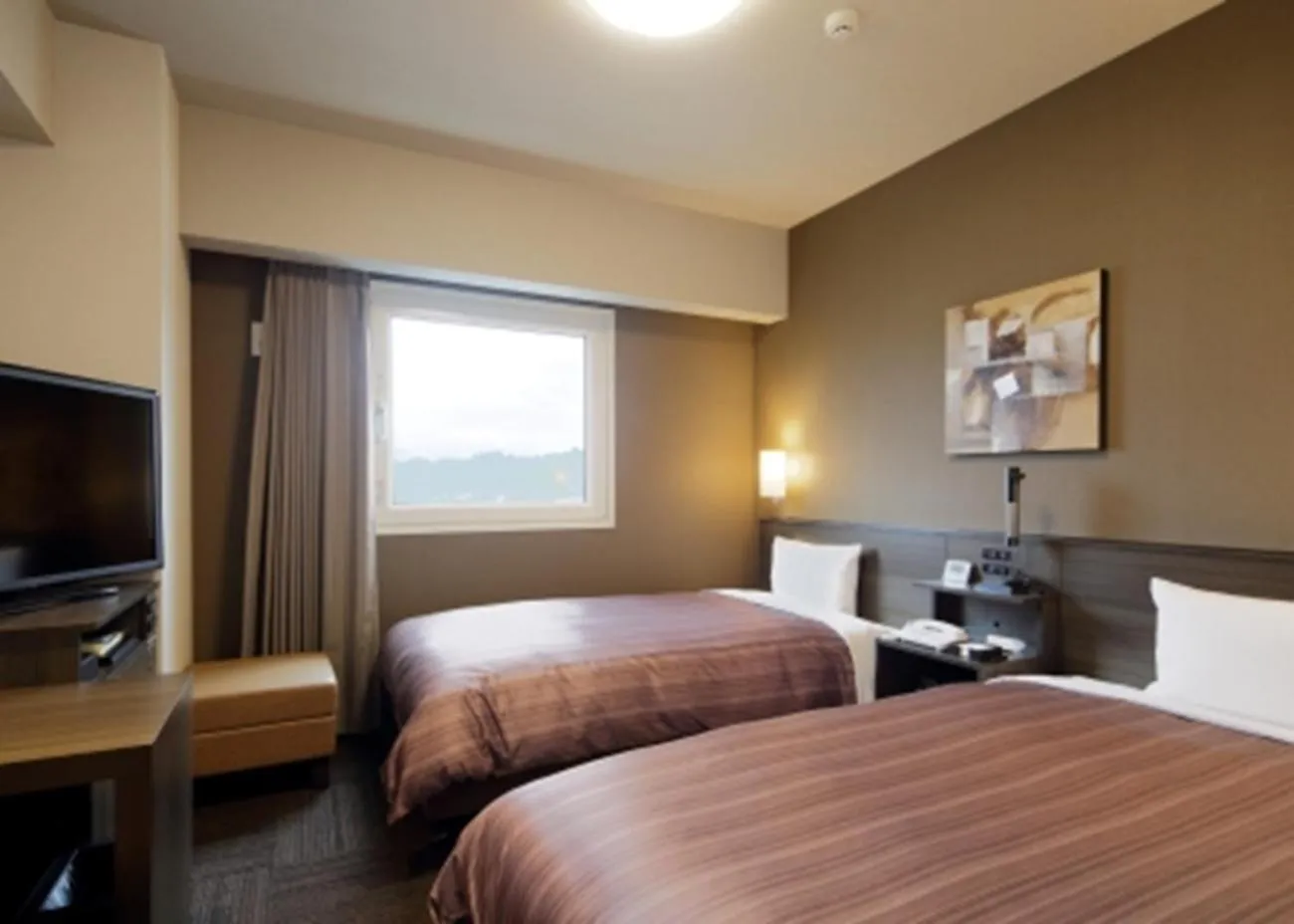 Photo of the whole room, Bed in Hotel Route-Inn Hita Ekimae